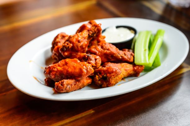 Order Chicken Wings food online from Chicago Pizza Kitchen store, Albuquerque on bringmethat.com