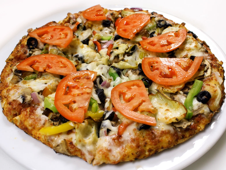 Order Small Vegetarian 10" food online from Pizza Leon store, Austin on bringmethat.com