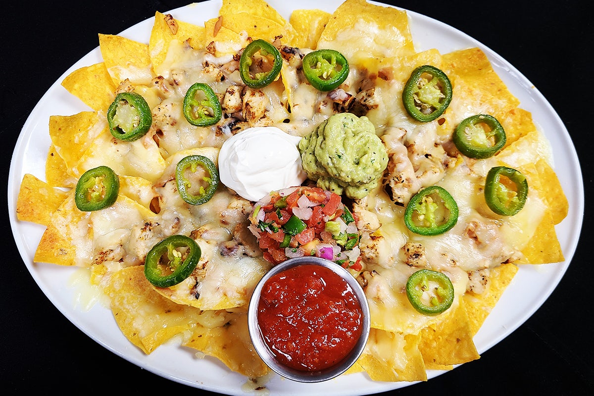 Order NACHOS food online from 54th Street Grill and Bar store, Arnold on bringmethat.com