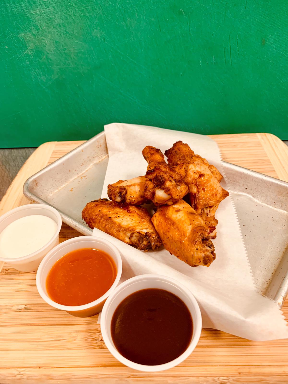 Order Baked Chicken Wings - 5 pieces food online from Kings Pizza store, Orlando on bringmethat.com