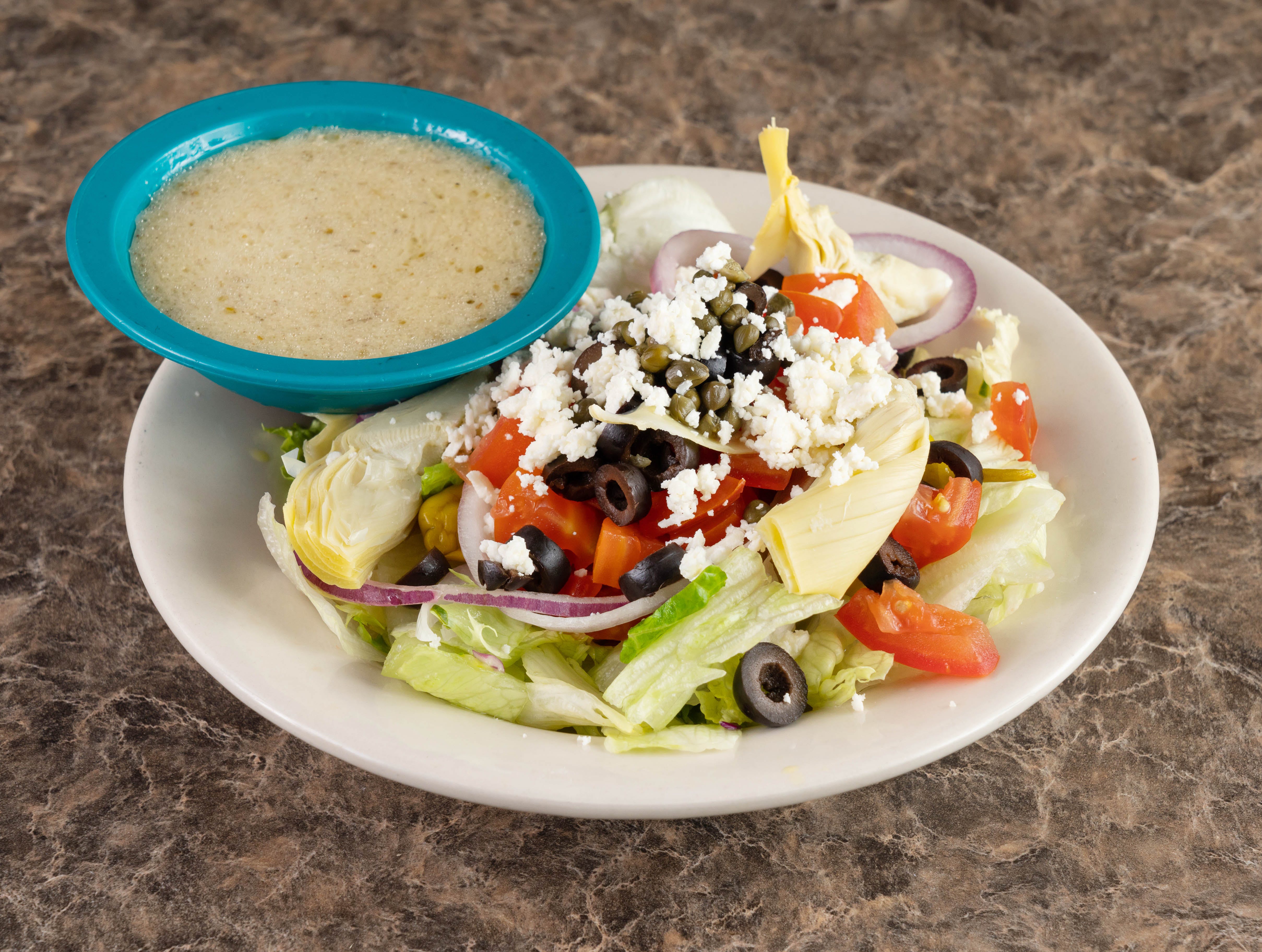Order Greek Salad - Salad food online from Mario Pizza & Pasta store, Seabrook on bringmethat.com