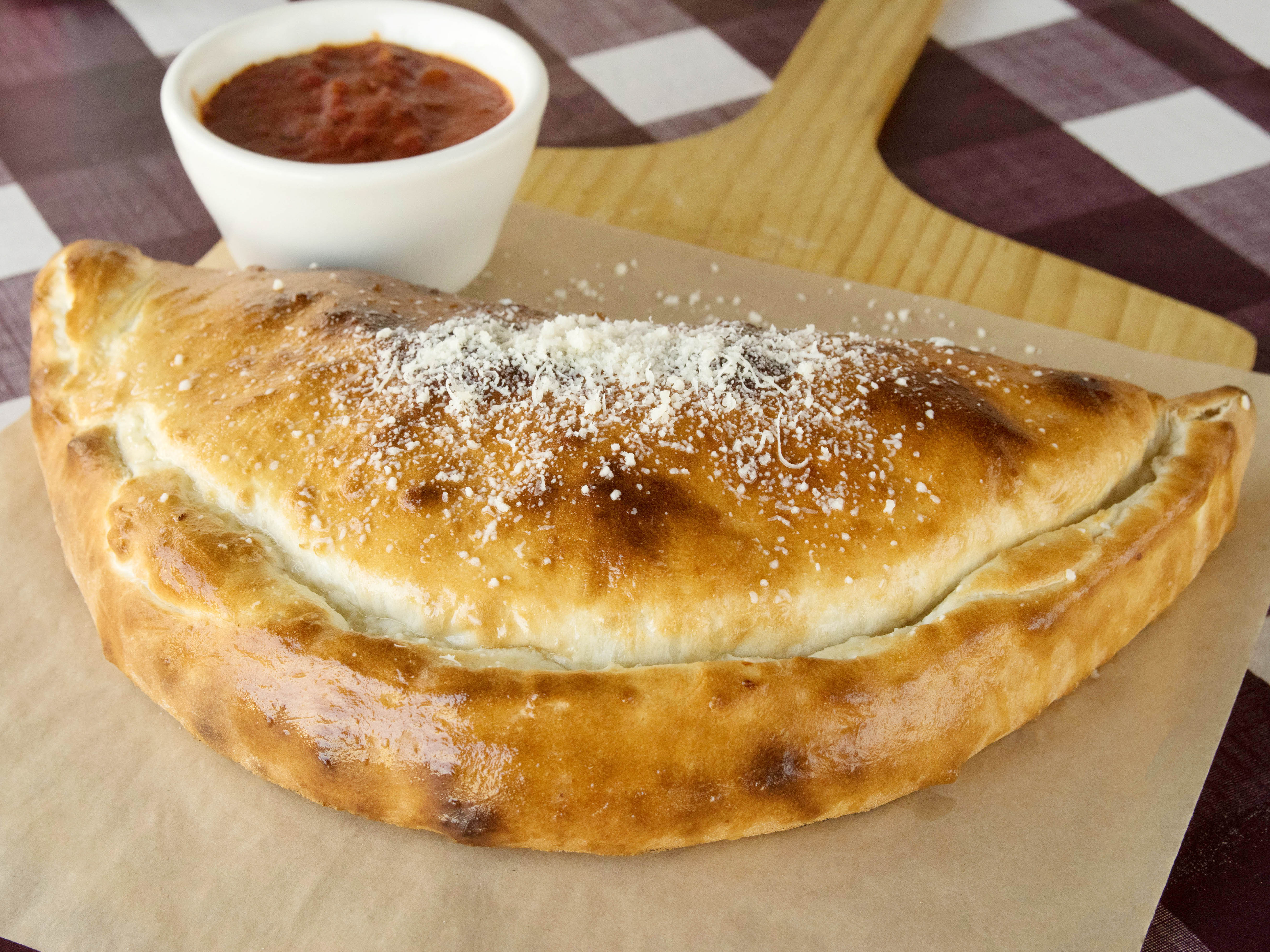 Order Smoked Mozzarella, Chicken and Broccoli Calzone food online from Lornas Italian Kitchen store, San Diego on bringmethat.com
