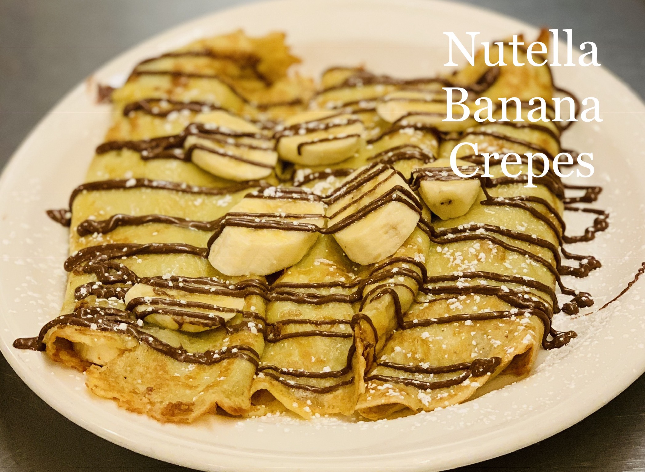 Order Nutella Banana Crepes food online from Parkway Family Restaurant store, Madison on bringmethat.com