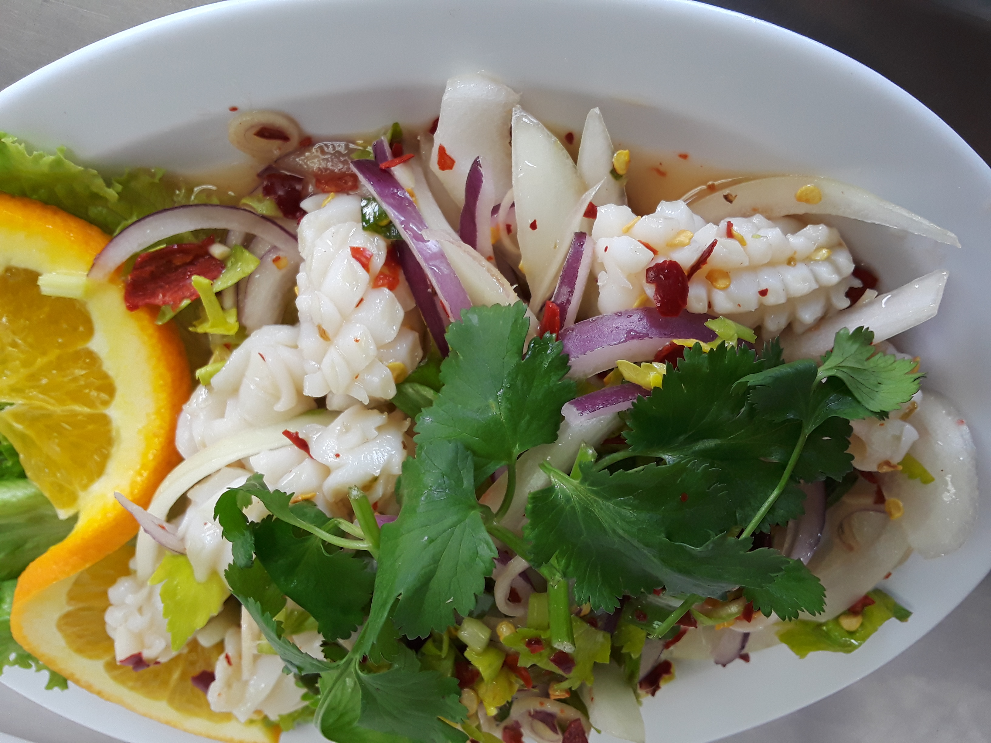 Order Spicy Squid salad food online from Chili & Lemon Thai Cuisine store, Los Angeles on bringmethat.com