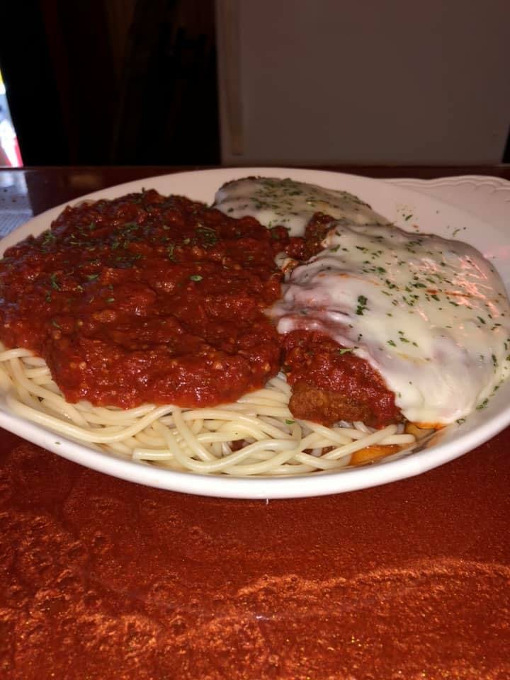 Order Chicken Parmasen Dinner - Pasta food online from New York's Famous Pizza & Pasta store, Panama City on bringmethat.com