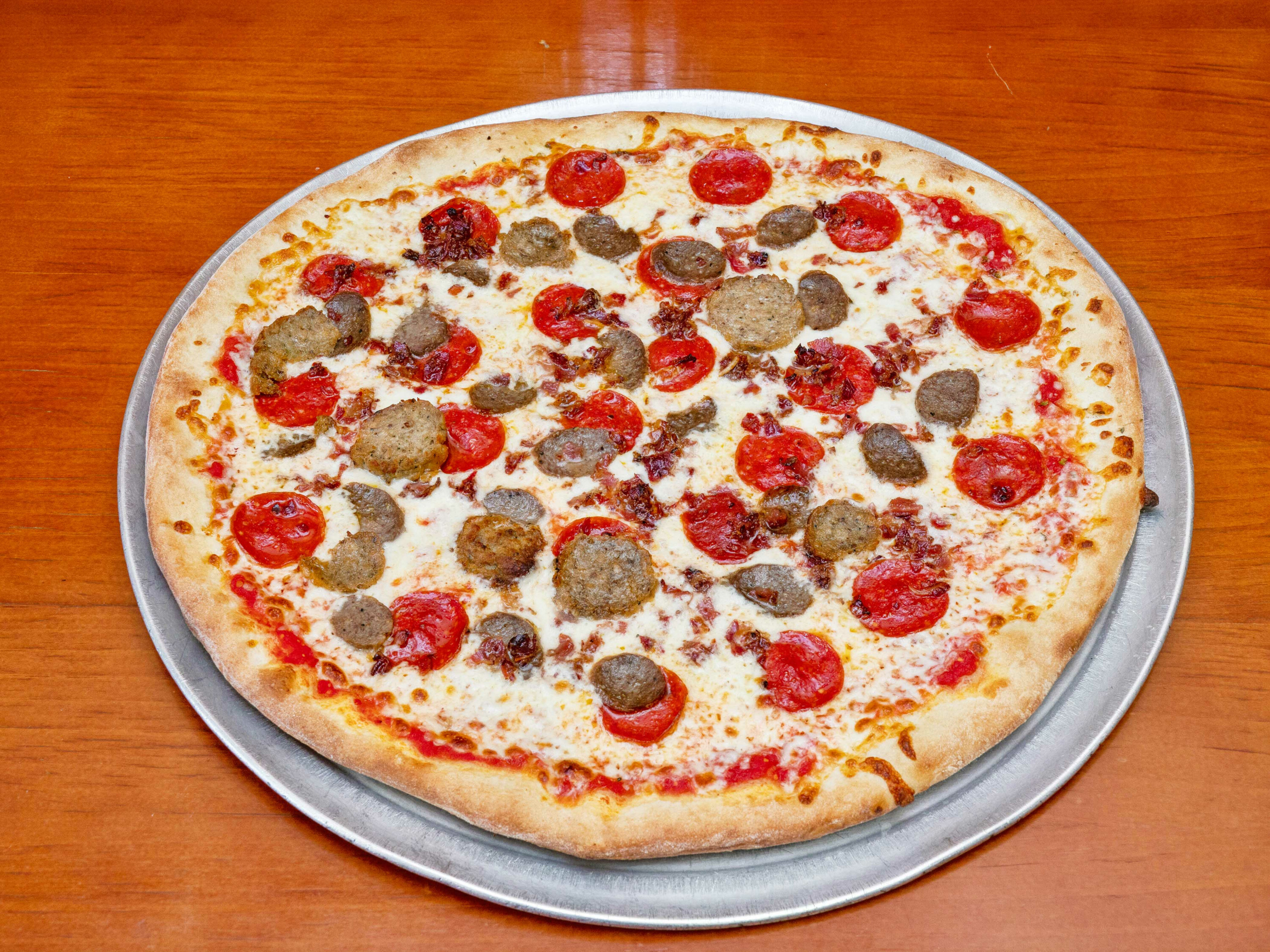 Order Meat Lovers Pizza food online from Bella Villa store, West Haven on bringmethat.com