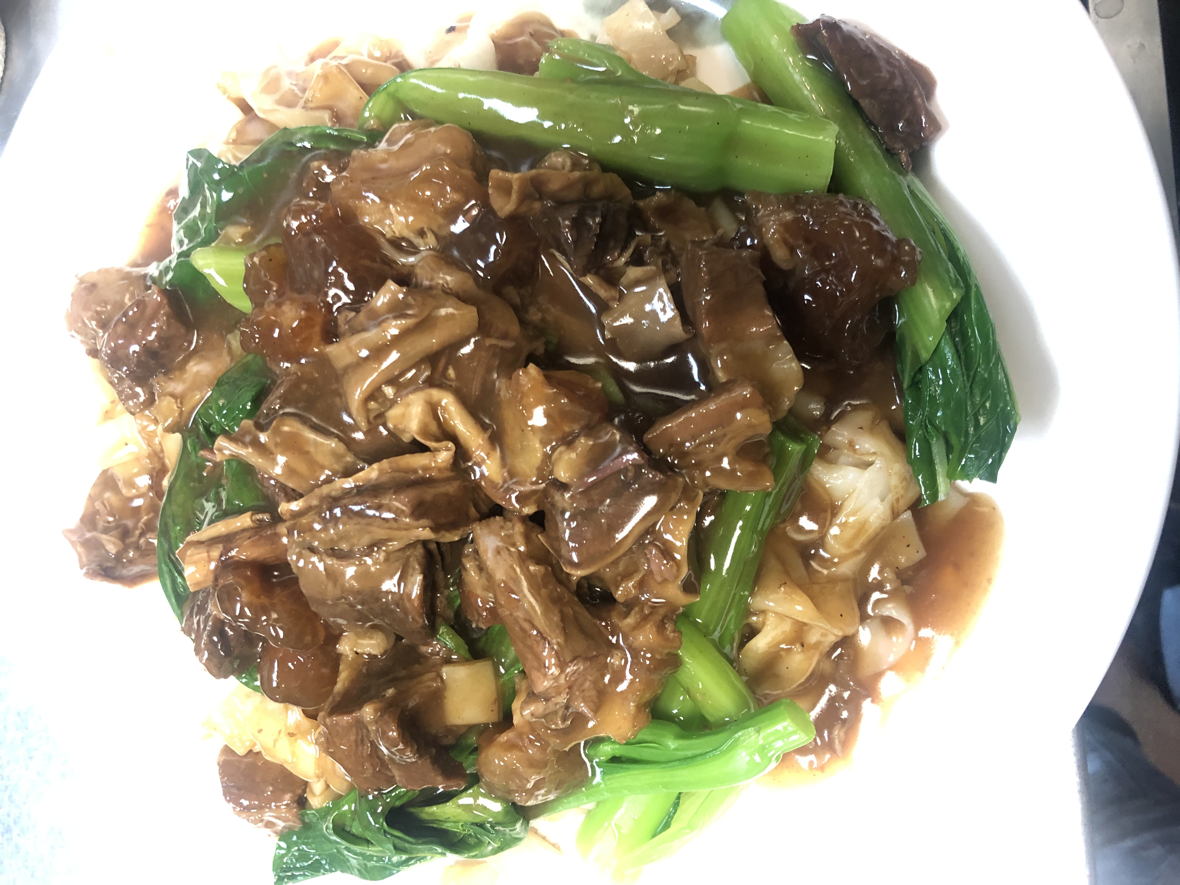 Order Beef stew chow fun with gravy湿炒牛腩河 food online from E&J Yummy Kitchen store, Monterey Park on bringmethat.com
