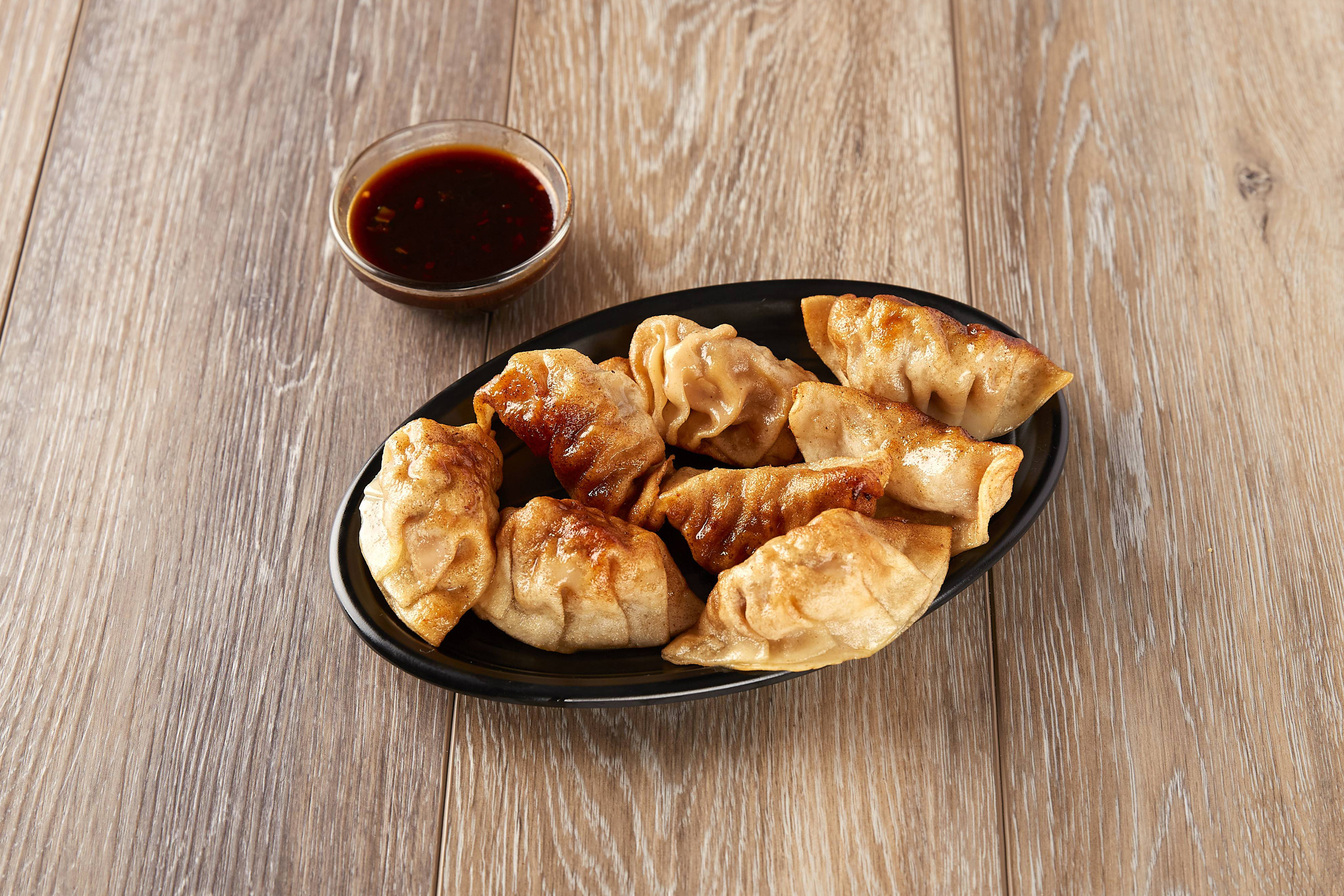 Order 8 Piece Fried Dumpling food online from China House store, Norfolk on bringmethat.com