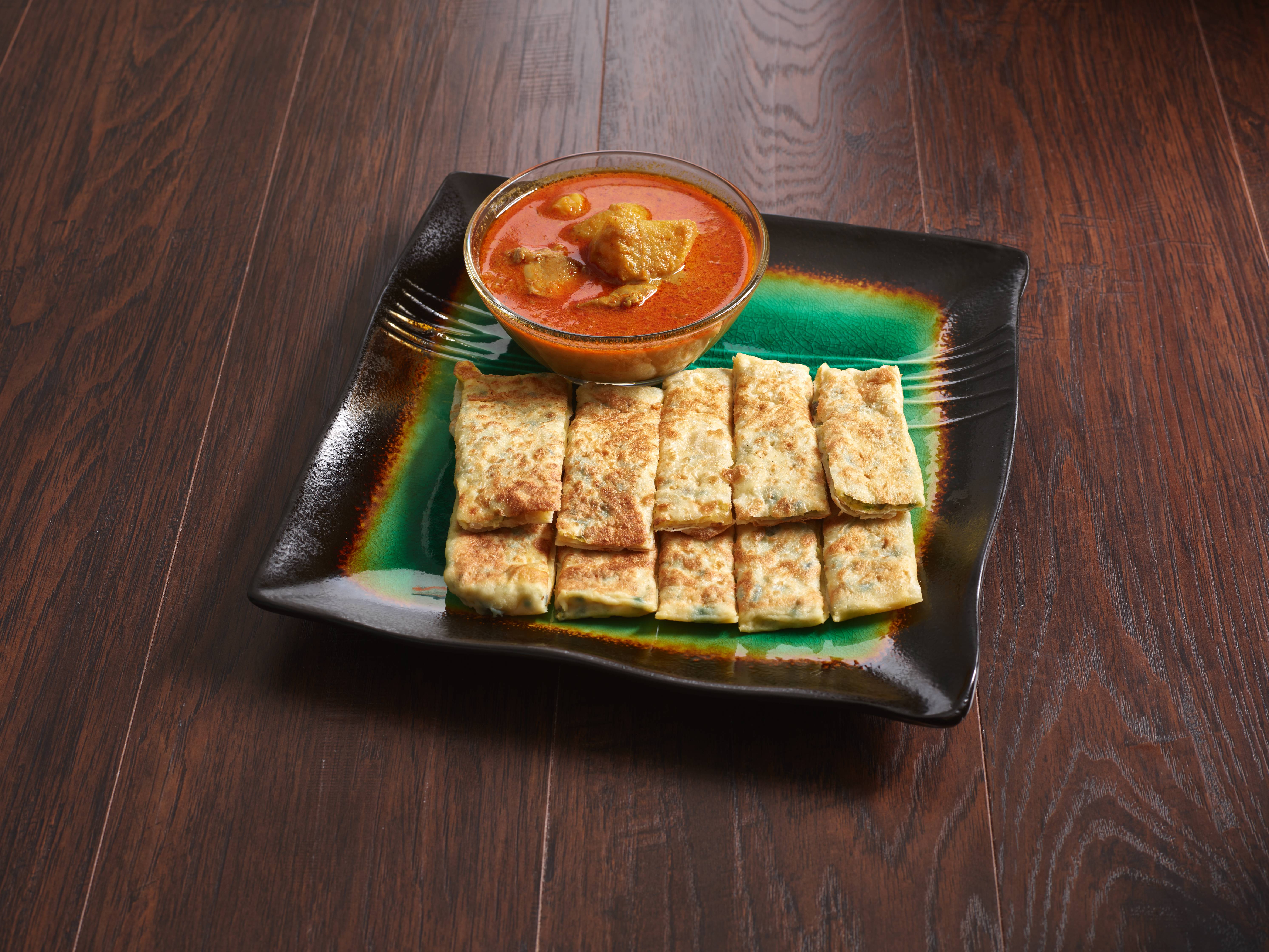 Order Roti Telur food online from Island Malaysian Cuisine store, Las Vegas on bringmethat.com