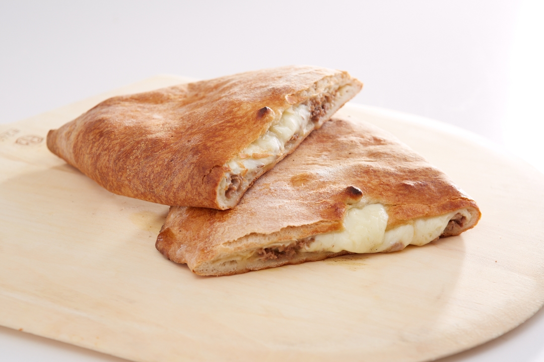 Order Steak Bomb Calzone food online from Sals Just Pizza store, North Andover on bringmethat.com