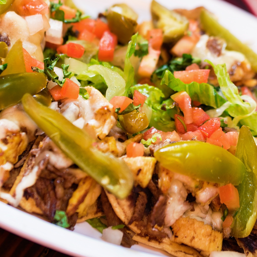Order Chicken Nachos food online from Homemade Taqueria store, Brooklyn on bringmethat.com