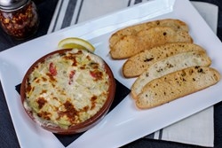 Order Famous Spicy Artichoke Dip food online from Bitcoin Pizza store, Santa Barbara on bringmethat.com