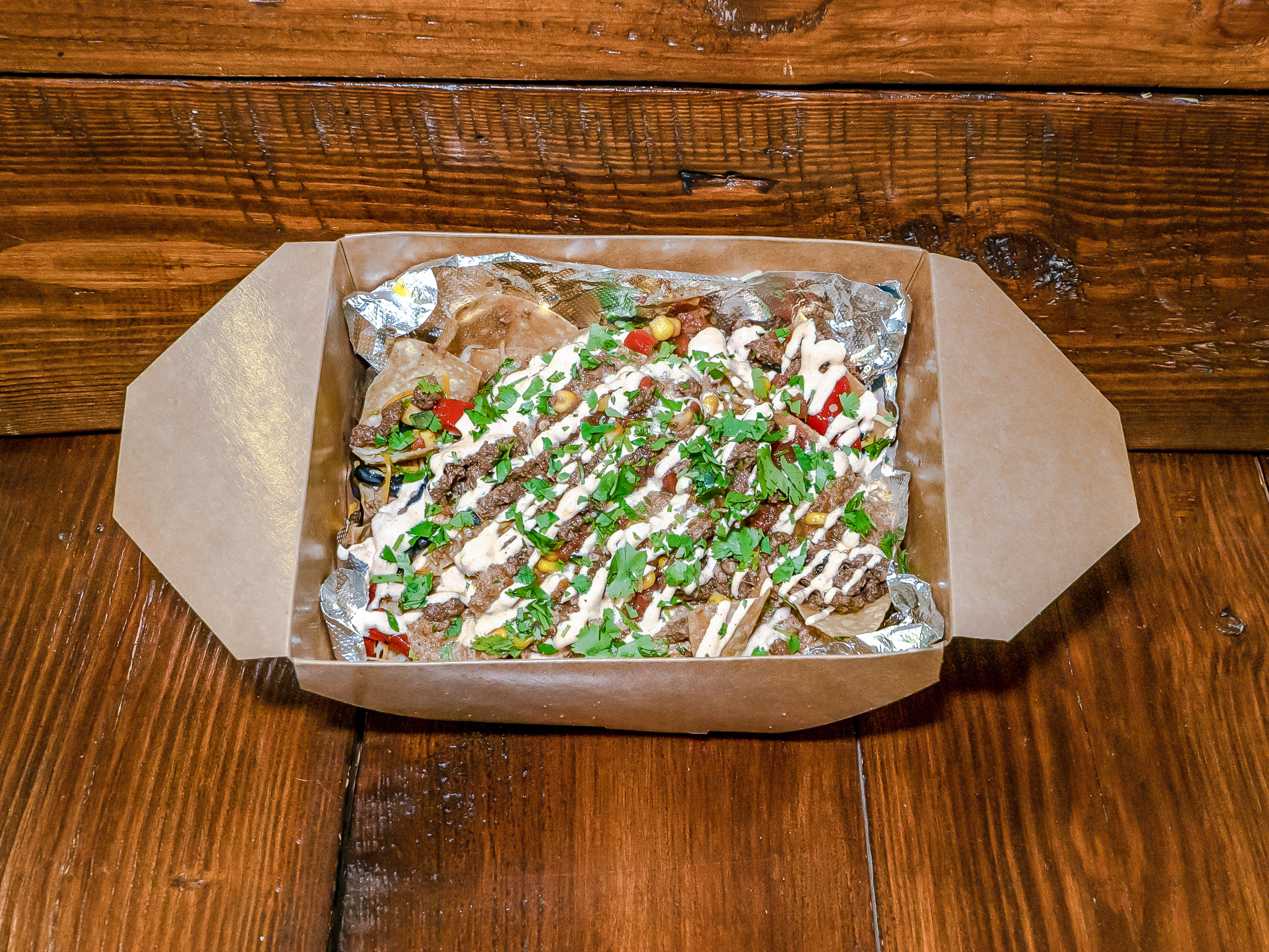 Order Steak Nachos: Chile Marinated and Grilled Steak food online from Chuckwagon Catering store, Waldorf on bringmethat.com