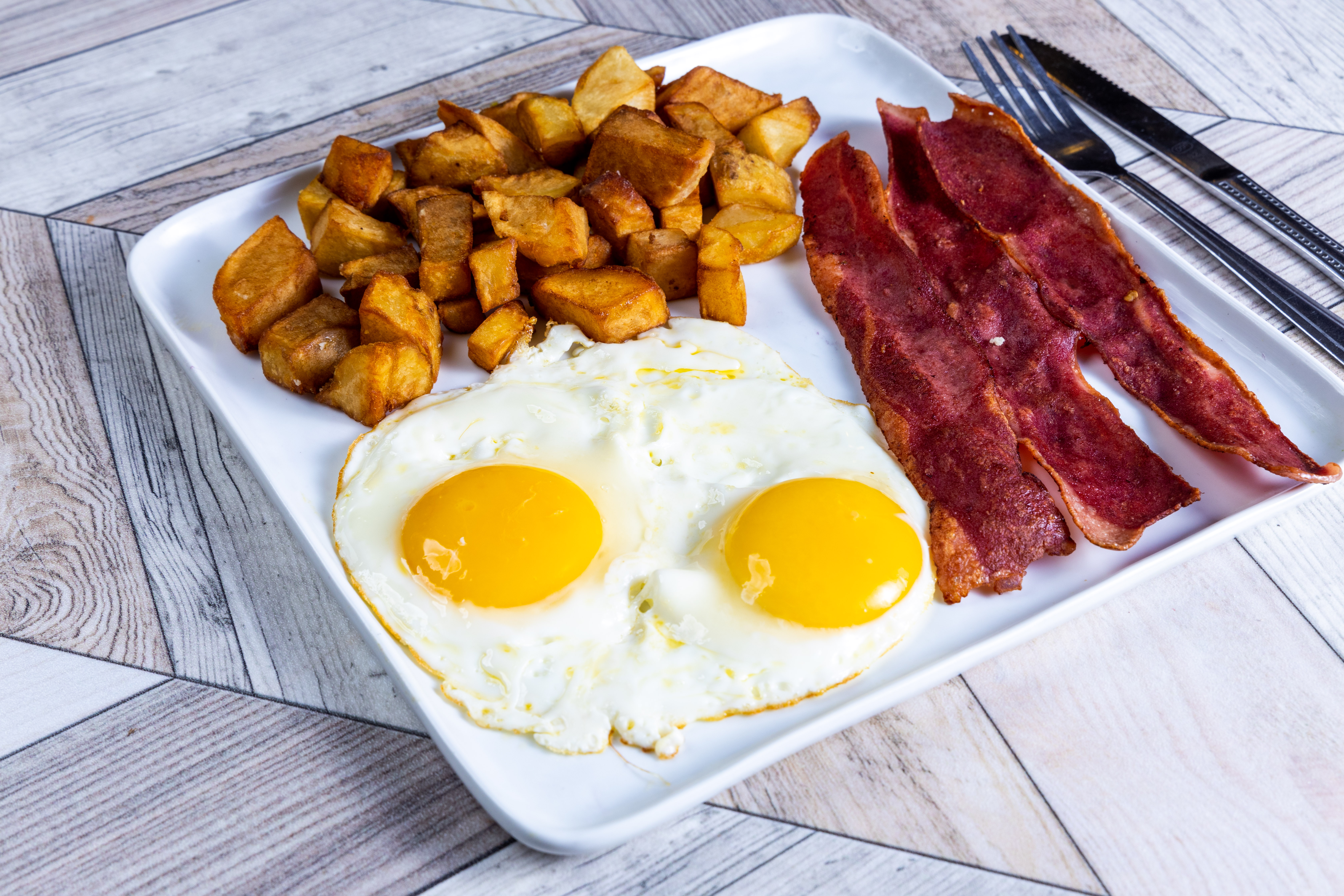 Order Extra Large Eggs Any Style with Turkey Bacon food online from Top View Restaurant store, Chicago on bringmethat.com