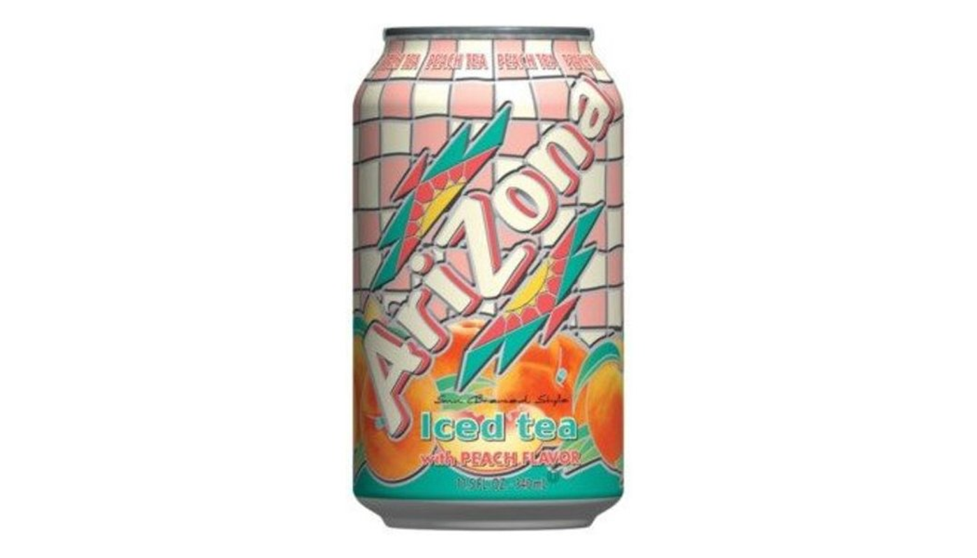 Order Arizona Iced Tea with Peach Flavor 23 oz Can food online from Circus Liquor store, Los Angeles on bringmethat.com
