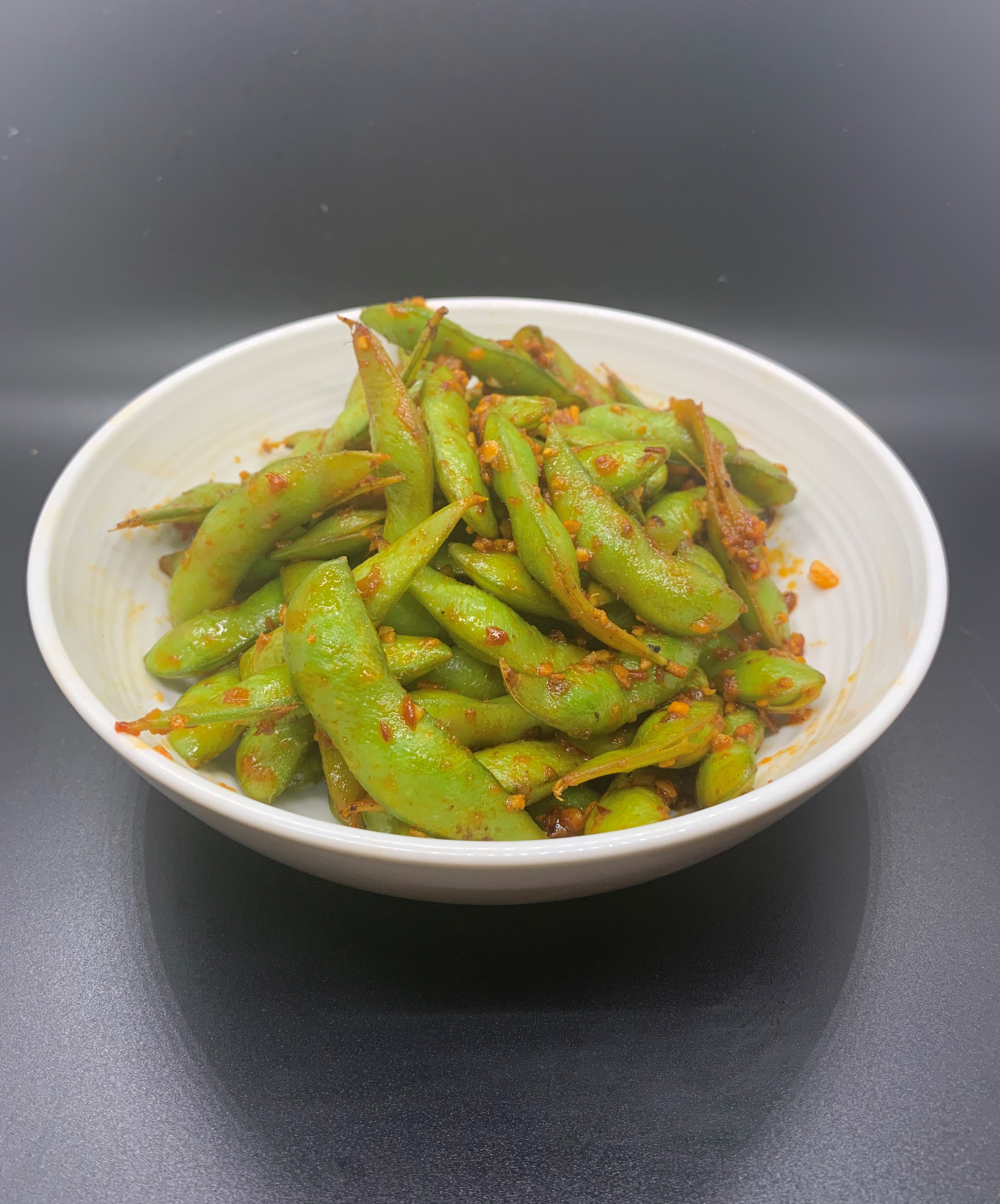 Order Spicy Edamame food online from House Of Pong store, Claremont on bringmethat.com