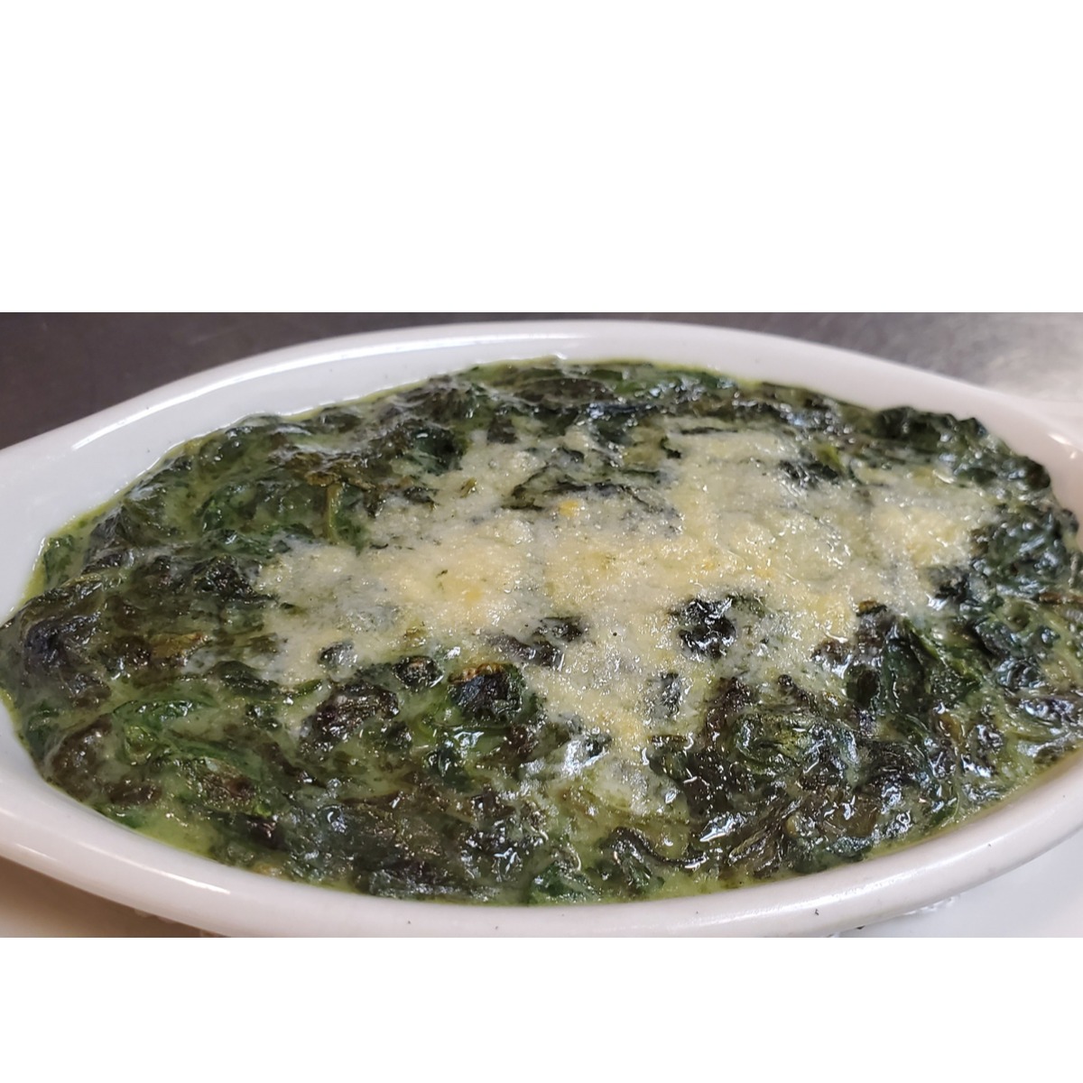 Order Creamed Spinach food online from LG's Prime Steakhouse store, La Quinta on bringmethat.com