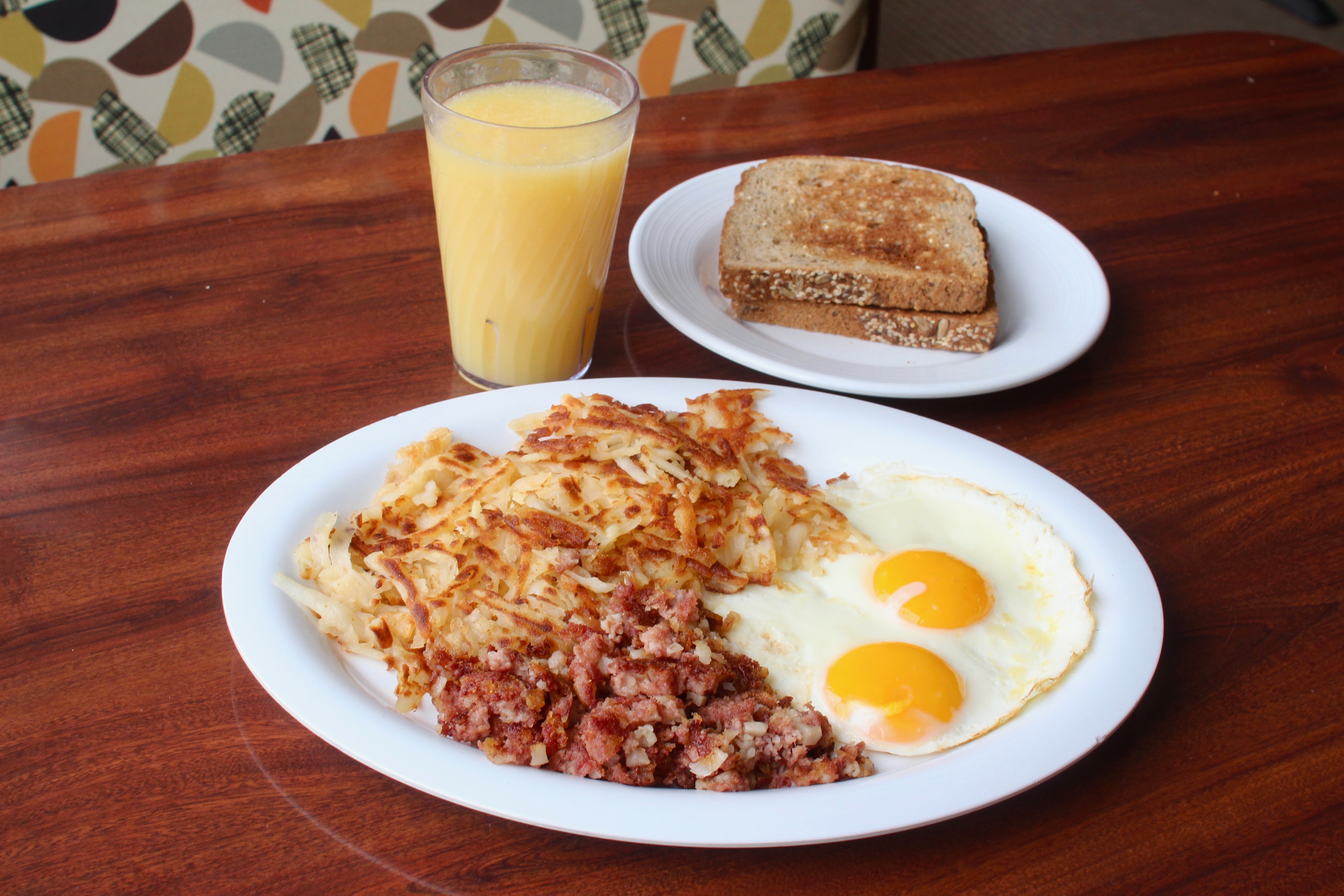 Order 2 Eggs & Corned Beef Hash food online from Deluxe Diner store, Chicago on bringmethat.com