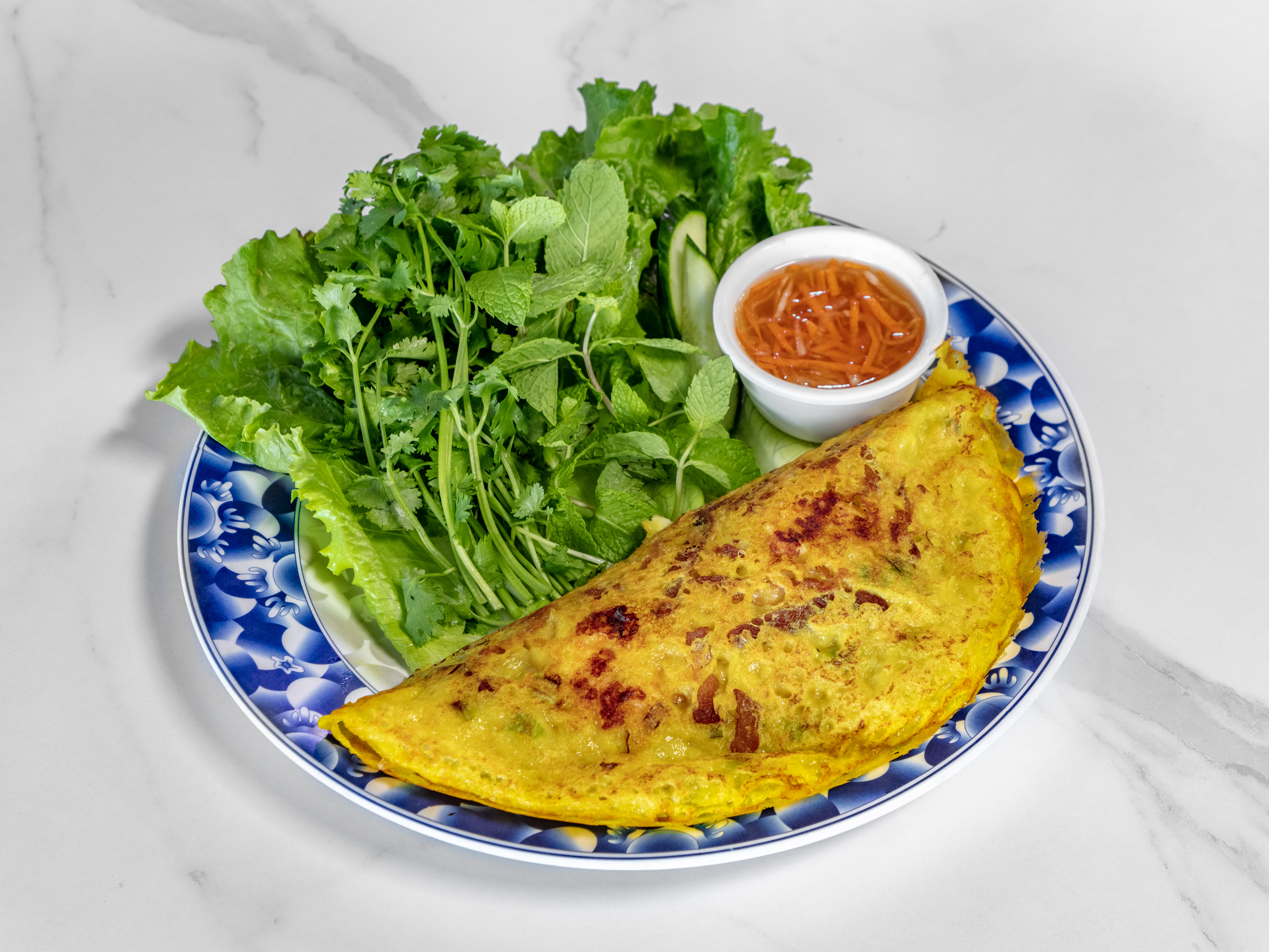 Order 40. Rice Crepe Banh Xeo food online from Saigon nites store, Scottsdale on bringmethat.com