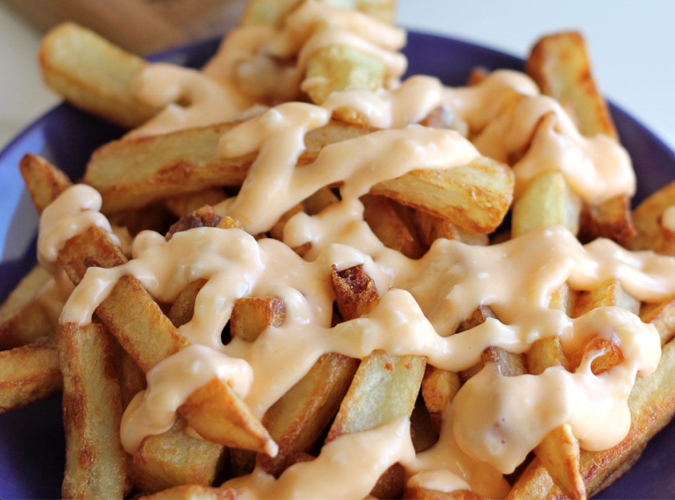 Order French Fries with Queso food online from O'callaghan Pub store, Rochester on bringmethat.com