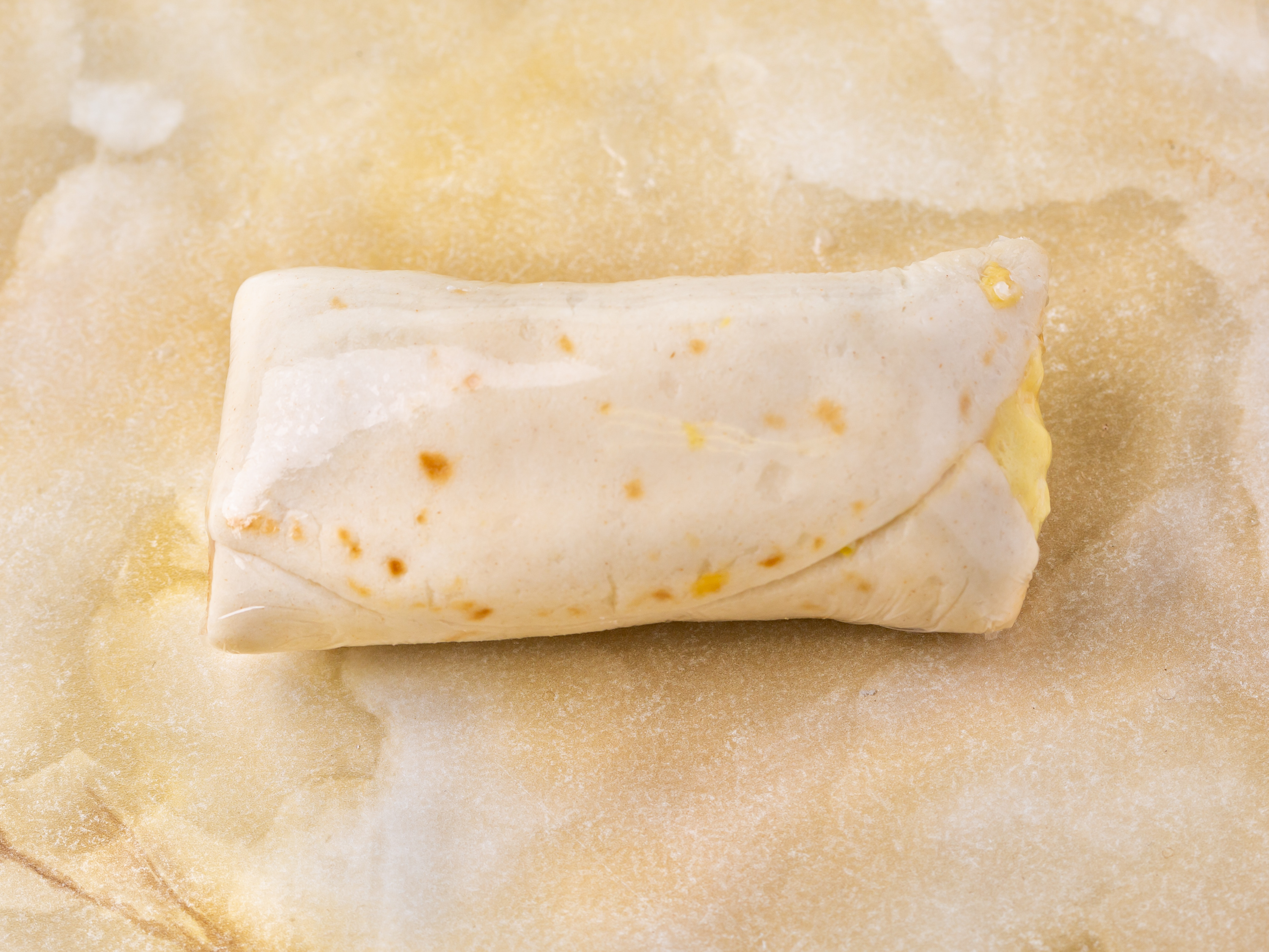 Order Sausage, Egg, and Cheese Burrito food online from Best Donuts store, Killeen on bringmethat.com