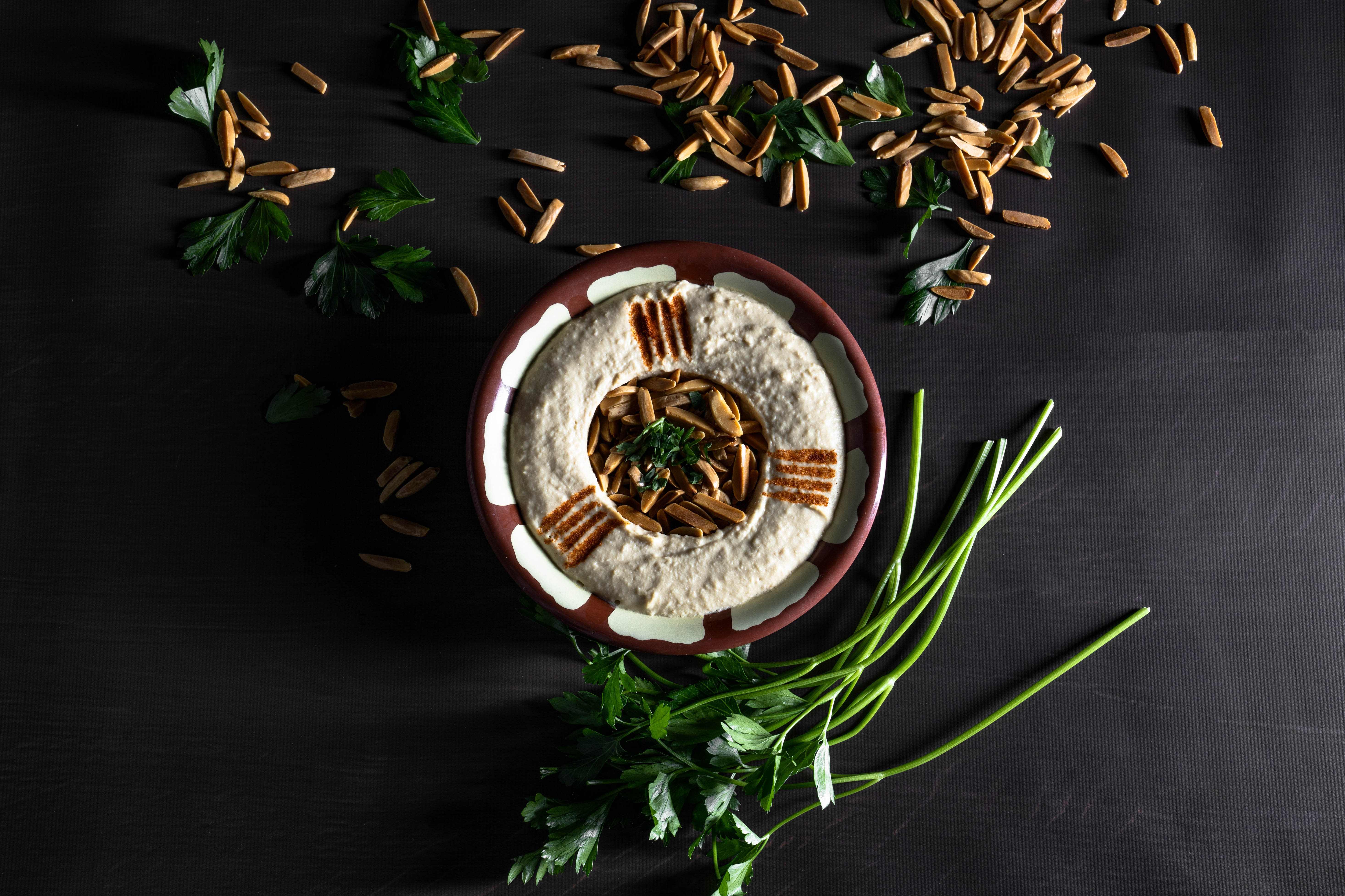 Order Hummus w/ Almonds food online from Kamils Lebanese Cuisine store, Clifton on bringmethat.com