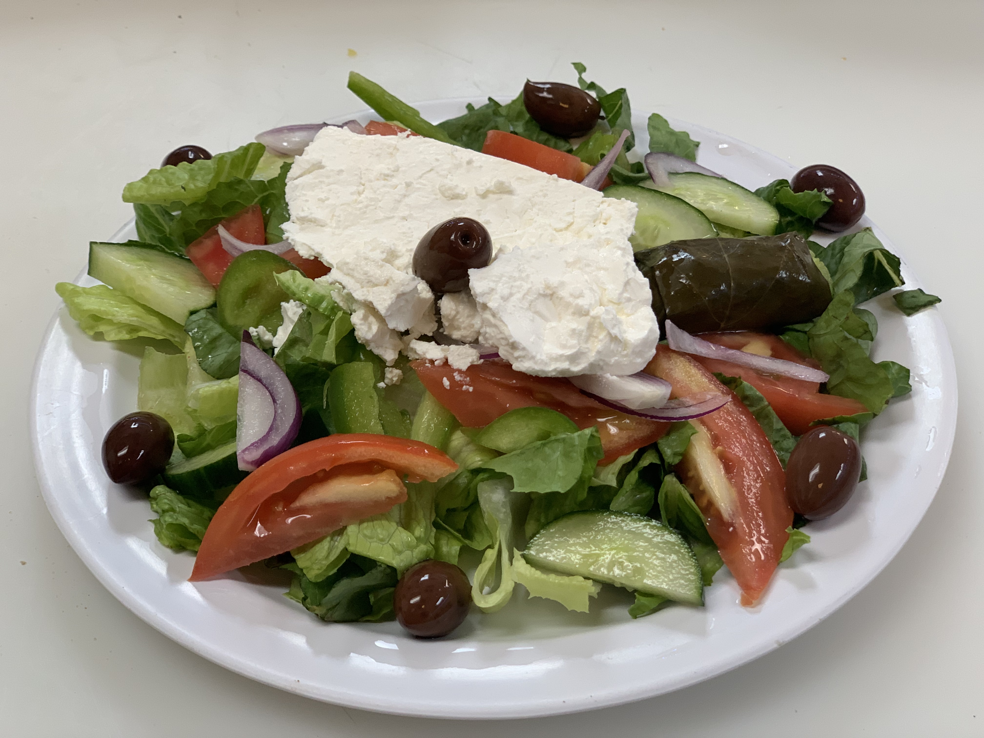 Order  Greek Salad food online from 204 Grill Pizza and Subs store, Virginia Beach on bringmethat.com