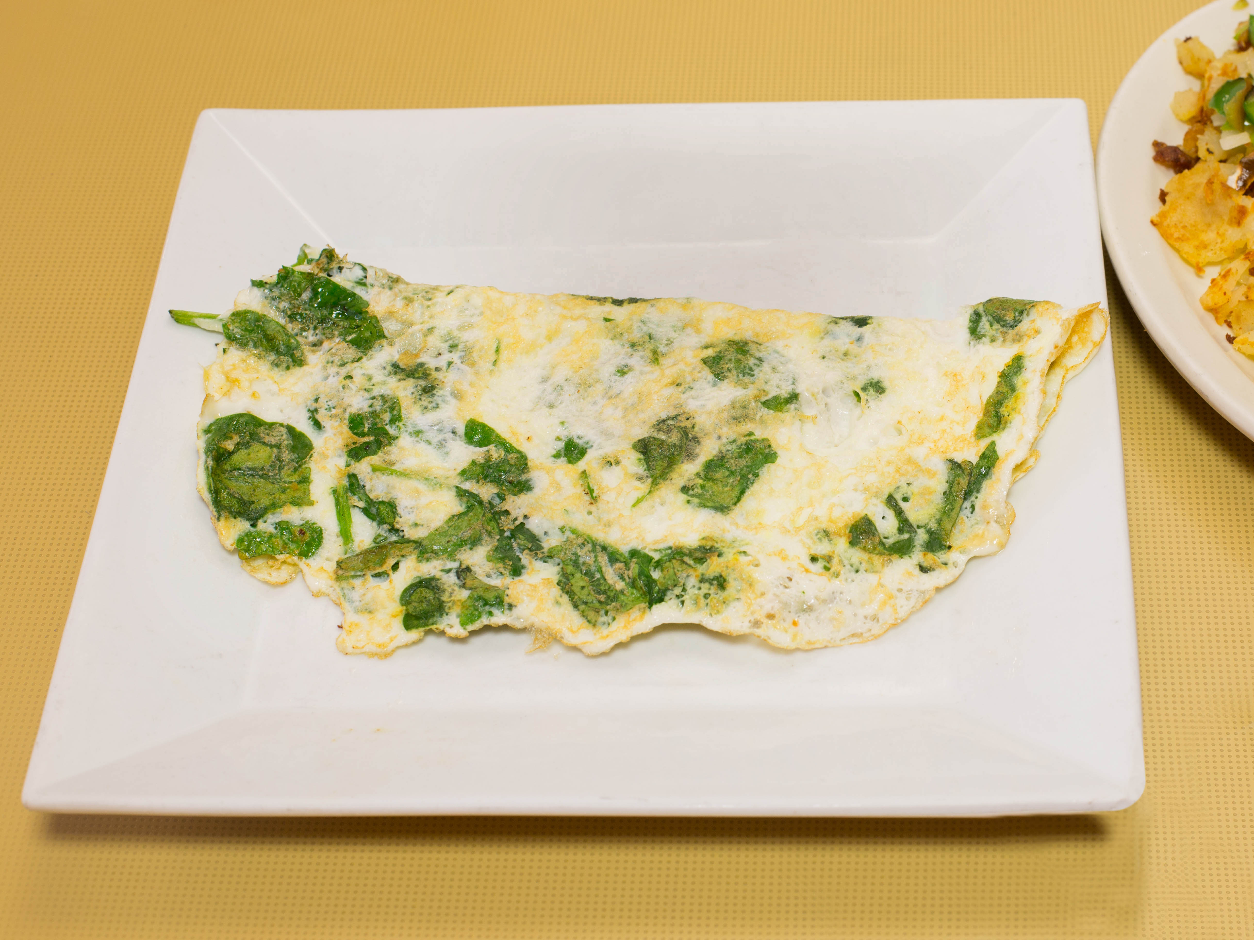 Order Tomato and Spinach Omelette Breakfast food online from Mannys Preakness Diner store, Wayne on bringmethat.com