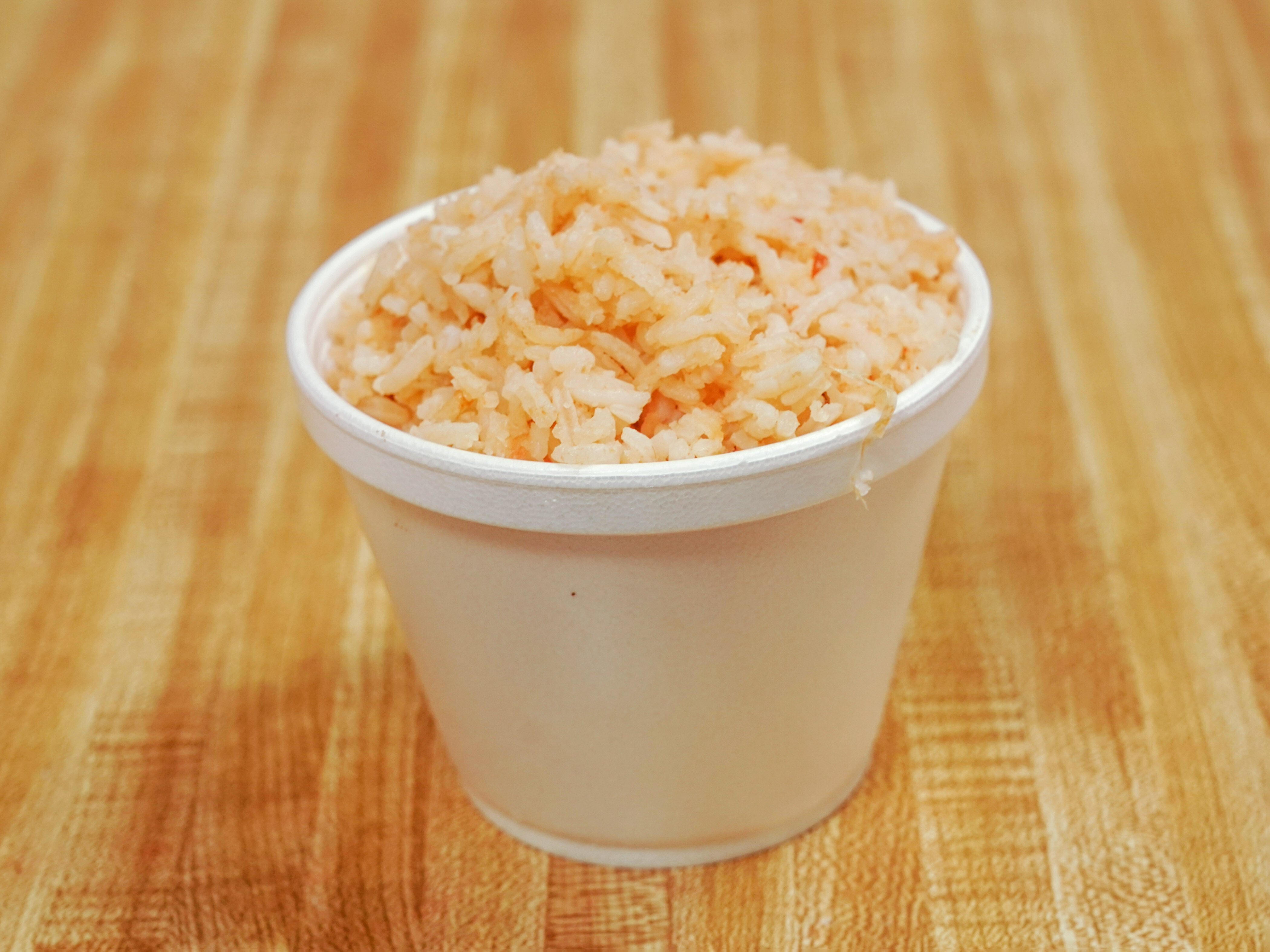 Order Arroz food online from Don Jacinto Pollo Grill store, Santa Ana on bringmethat.com