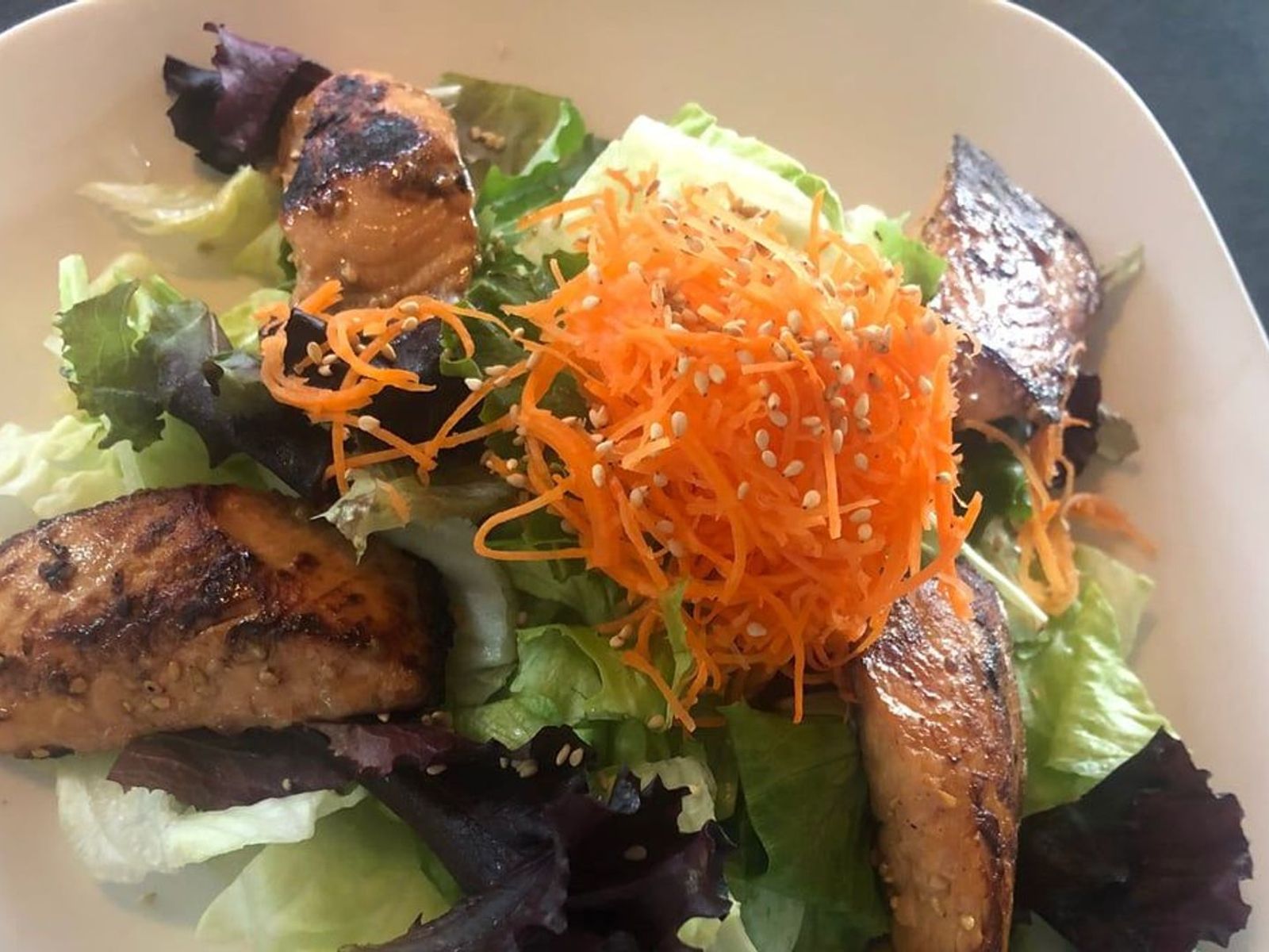 Order Grilled Sesame Salmon Salad food online from Sushi Aoi store, Washington on bringmethat.com