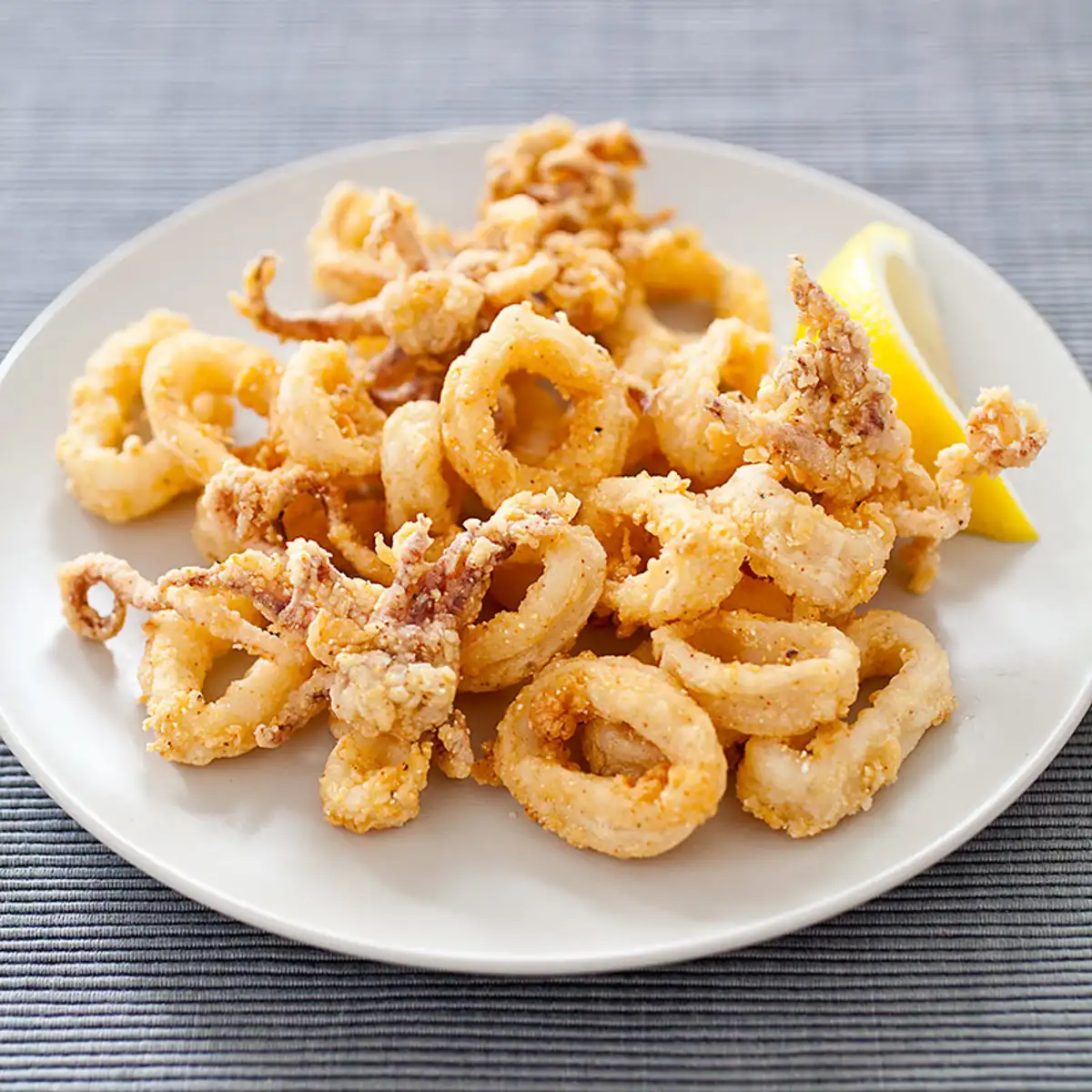 Order Fried Calamari food online from Picasso Pizza store, New York on bringmethat.com