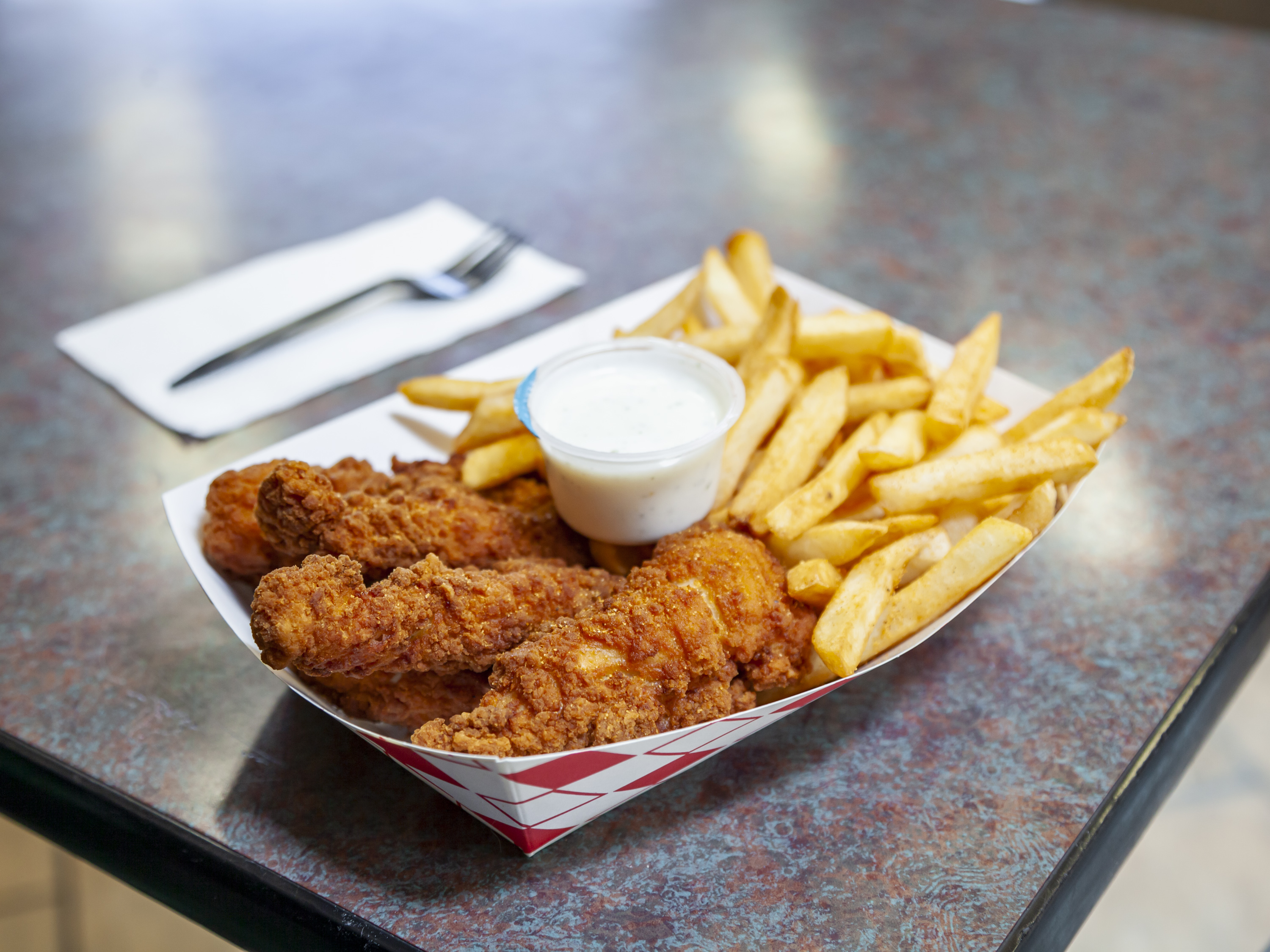 Order 6Pc Chicken Strips with Fries food online from Loaded Fries N' Wings store, San Francisco on bringmethat.com