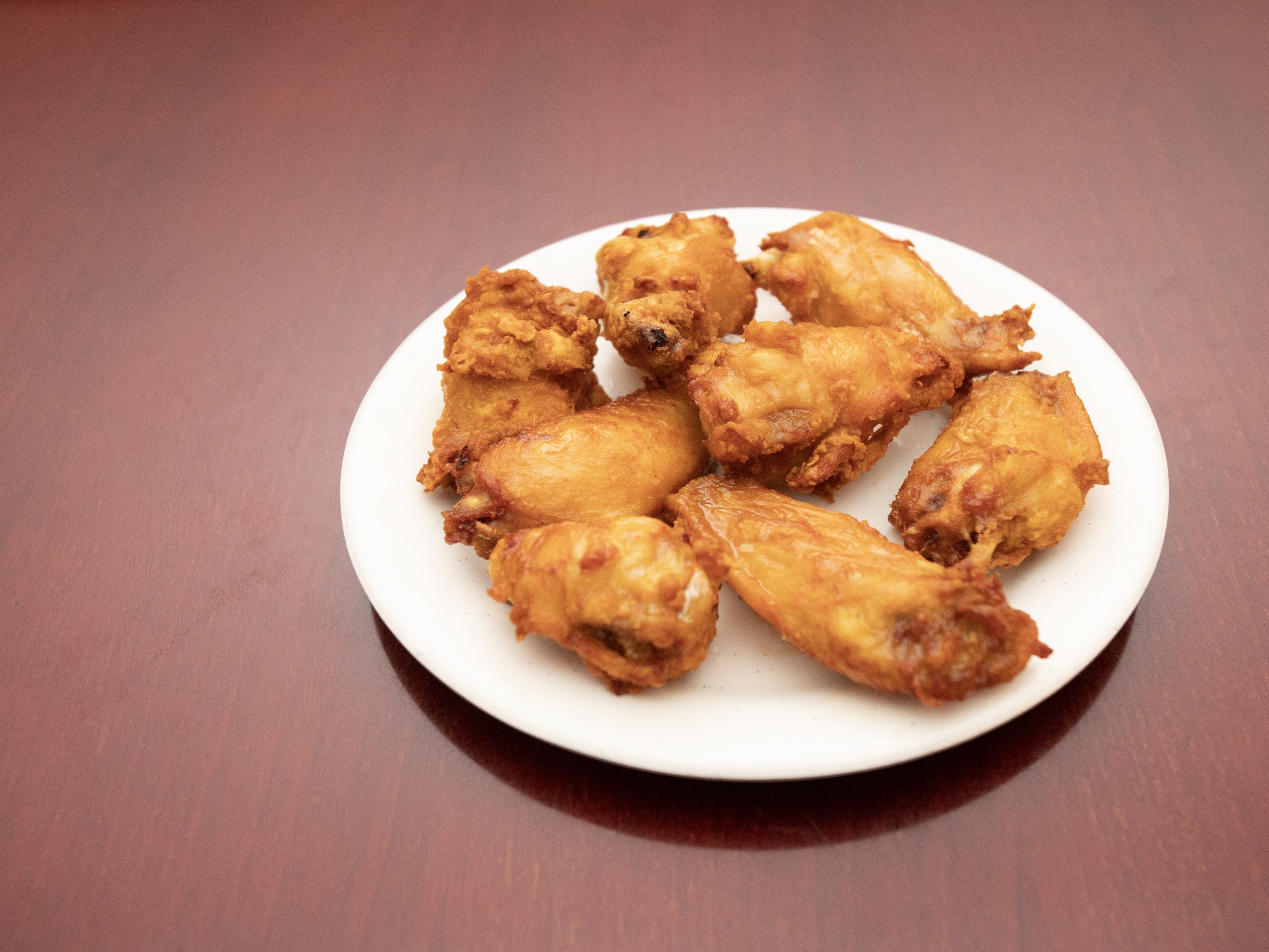 Order 8. Eight Pieces Fried Chicken Wings food online from International Buffet store, Omaha on bringmethat.com