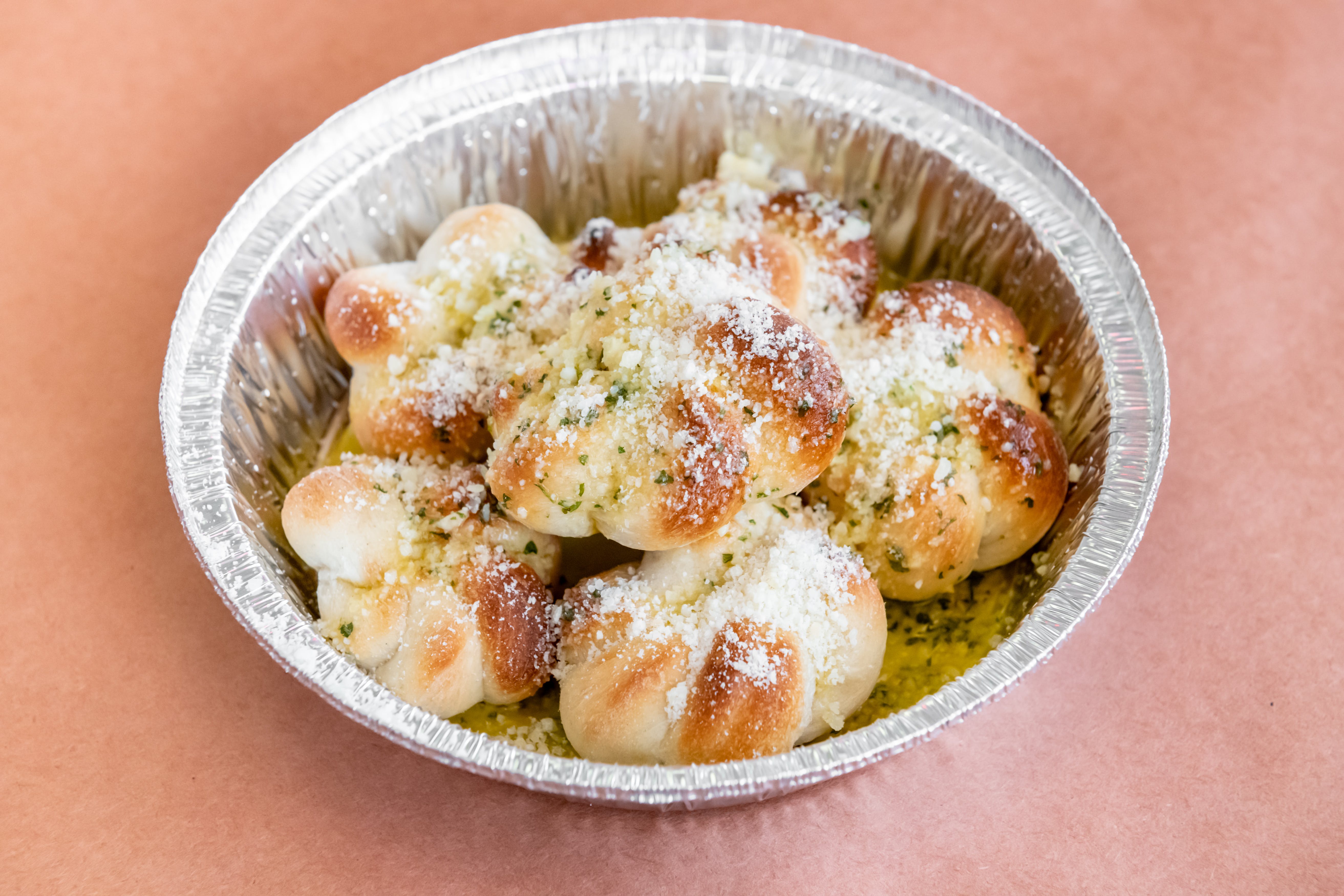 Order Garlic Knots - 6 Pieces food online from Renaldo's Apizza & Catering store, Southington on bringmethat.com