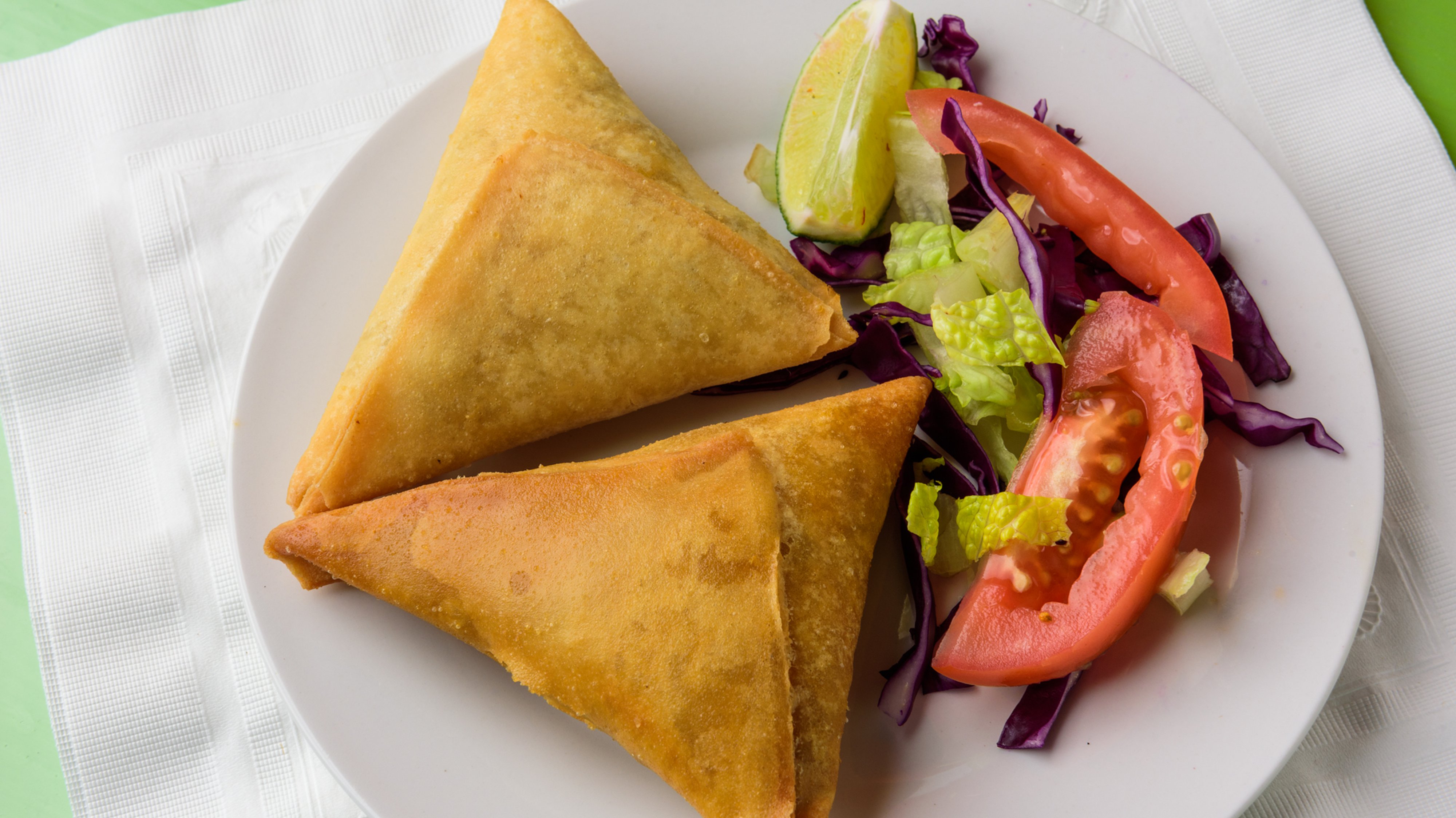 Order 2 Pieces Chicken Samosas food online from Indimex Eats Indian Restaurant store, Los Angeles on bringmethat.com