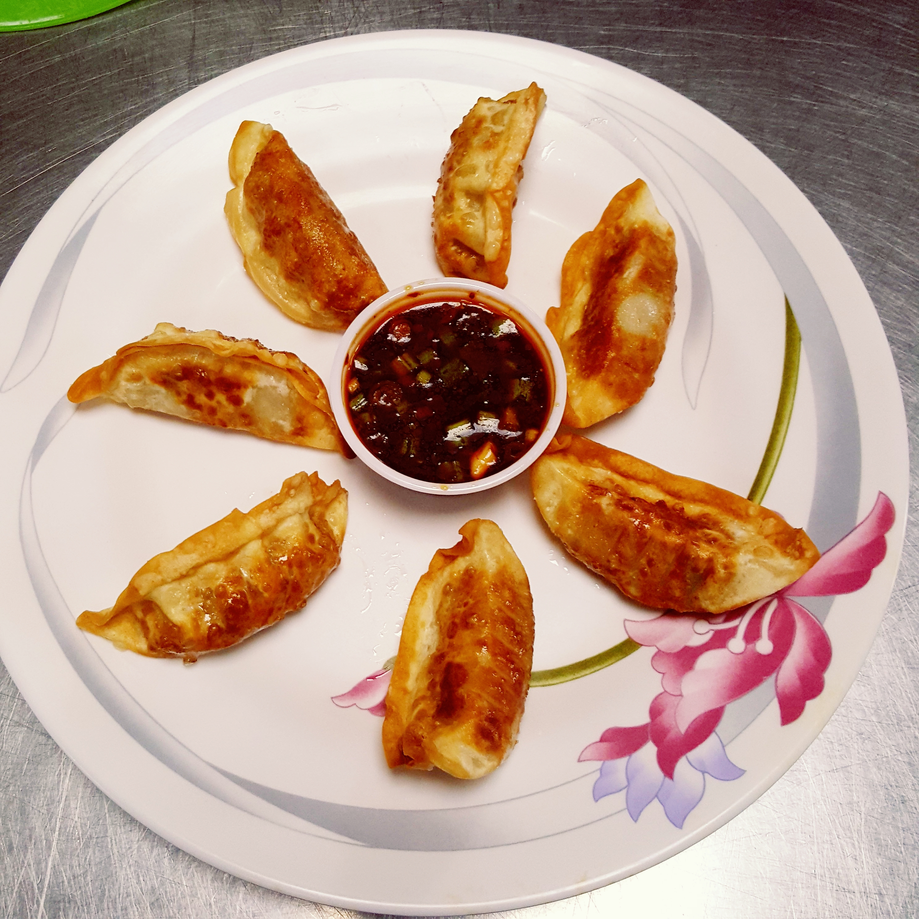 Order 4. Fried Dumplings food online from China Feast store, Kansas City on bringmethat.com
