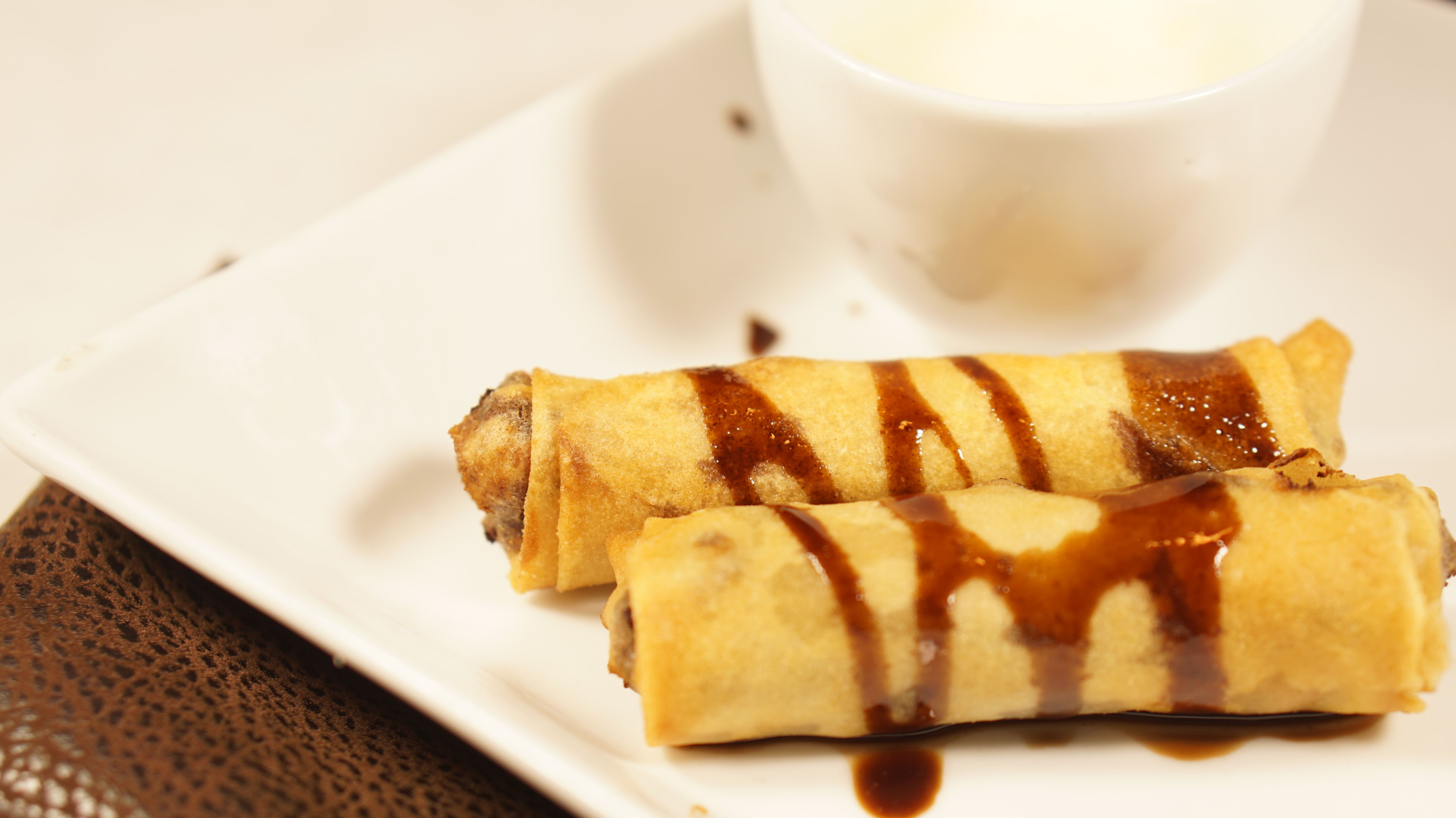Order Chocolate Spring Rolls (2 pcs) food online from Inchin Bamboo Garden store, Irvine on bringmethat.com