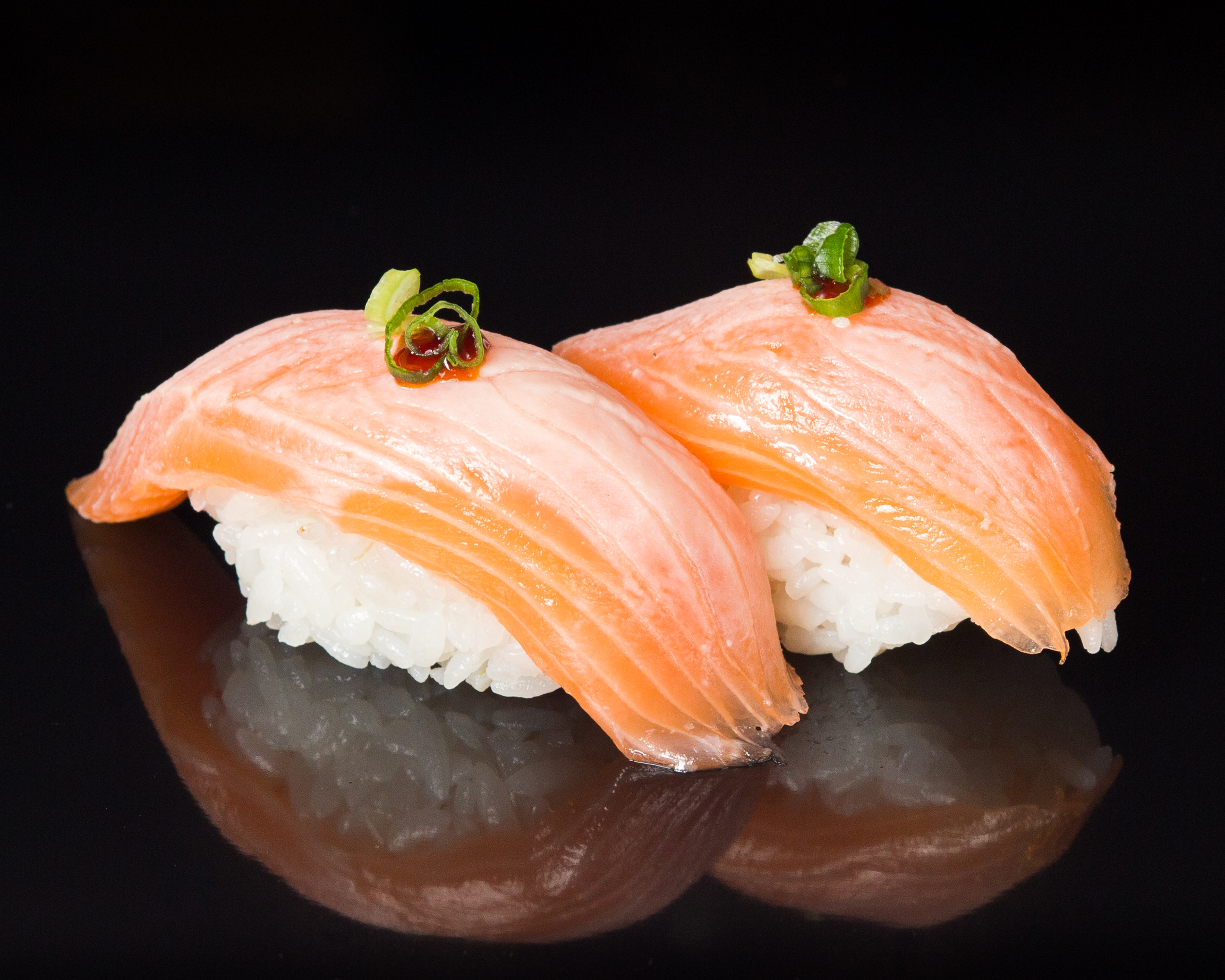 Order 2 Pieces Seared Salmon food online from Sushi Sakura Express store, Houston on bringmethat.com