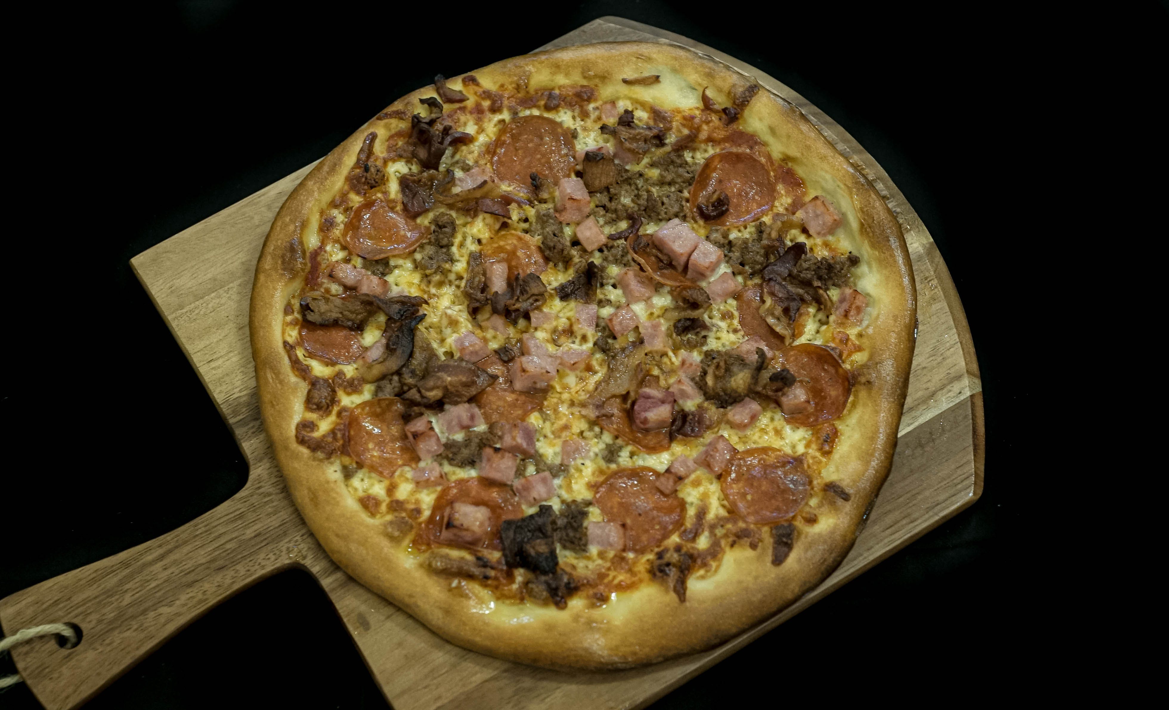 Order Meat Lover's Pizza - Small food online from Buongiorno Pizza E Pasta store, Los Angeles on bringmethat.com