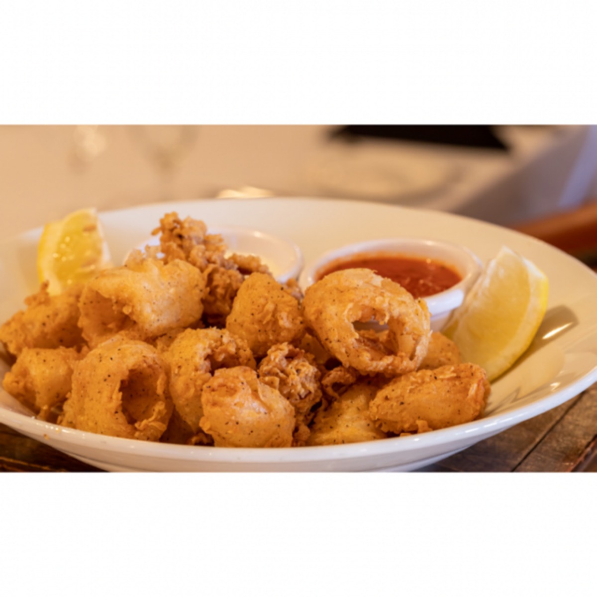 Order Crispy Calamari food online from LG's Prime Steakhouse store, La Quinta on bringmethat.com