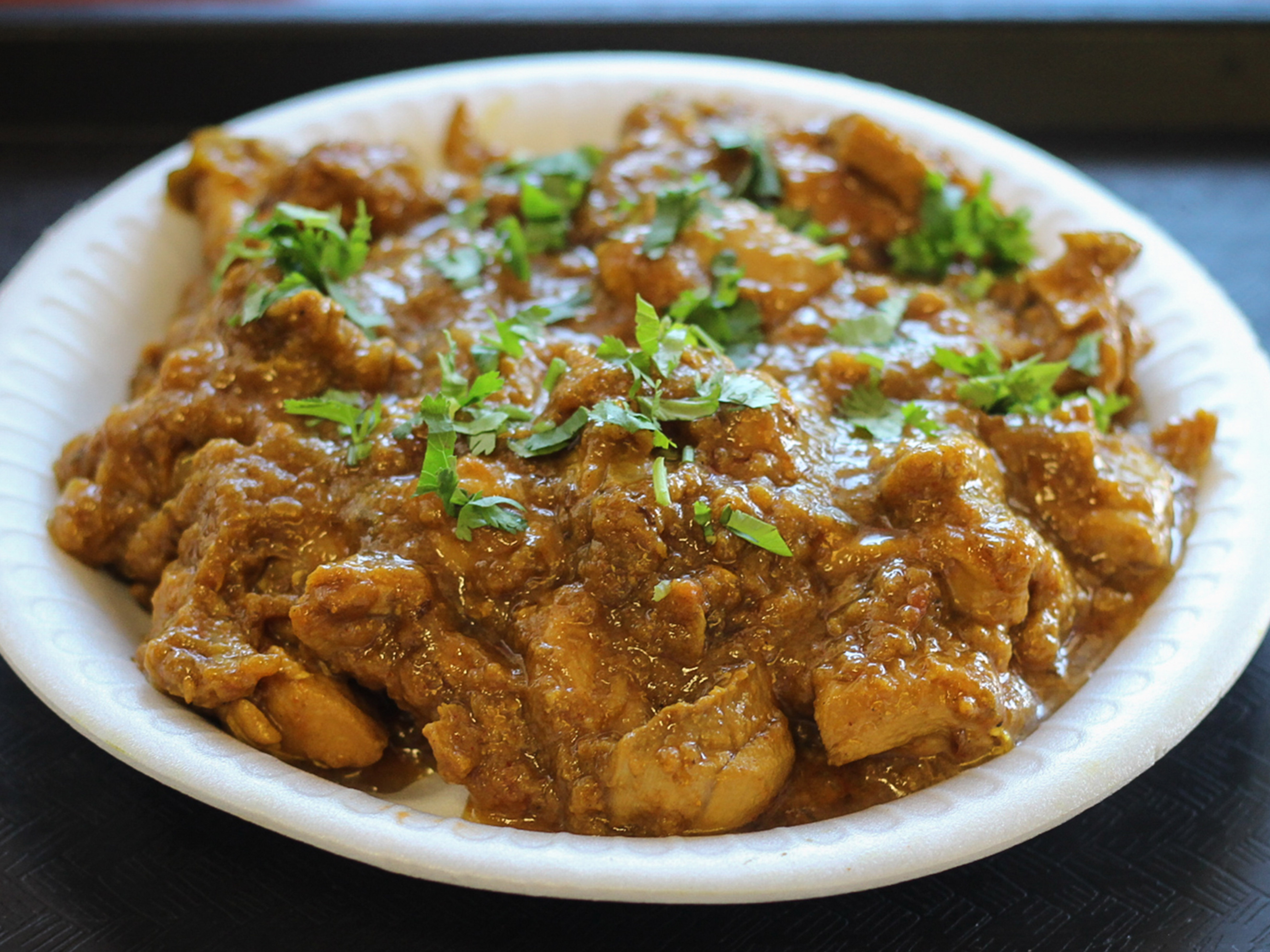 Order Chicken Curry food online from Golden Indian Grill & Pizza store, Los Angeles on bringmethat.com