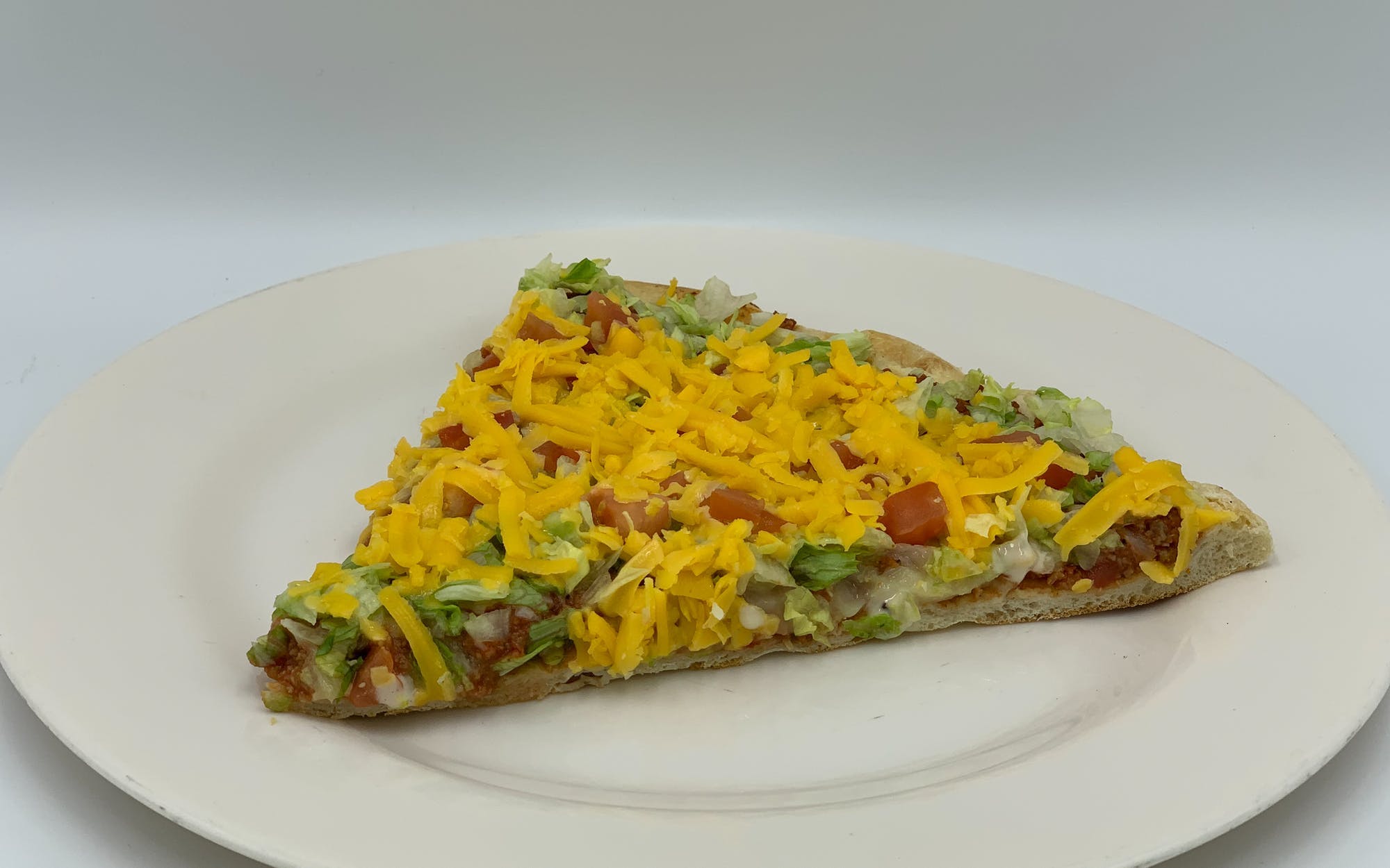 Order Taco Pizza - Personal food online from Mario Pizza store, Westbury on bringmethat.com