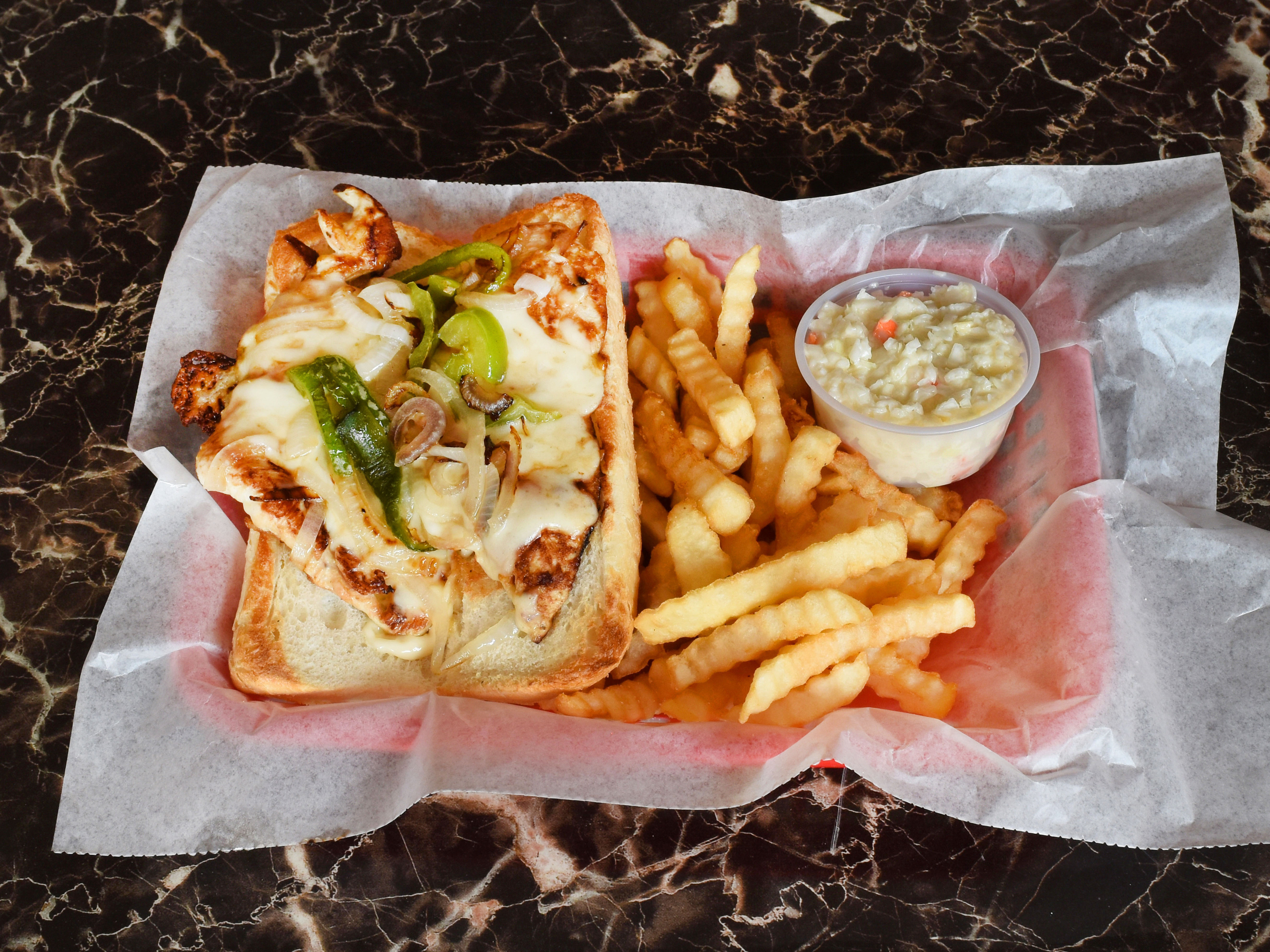 Order Chicken Philly Deluxe Sandwich  food online from Chely's Pizza store, Cicero on bringmethat.com