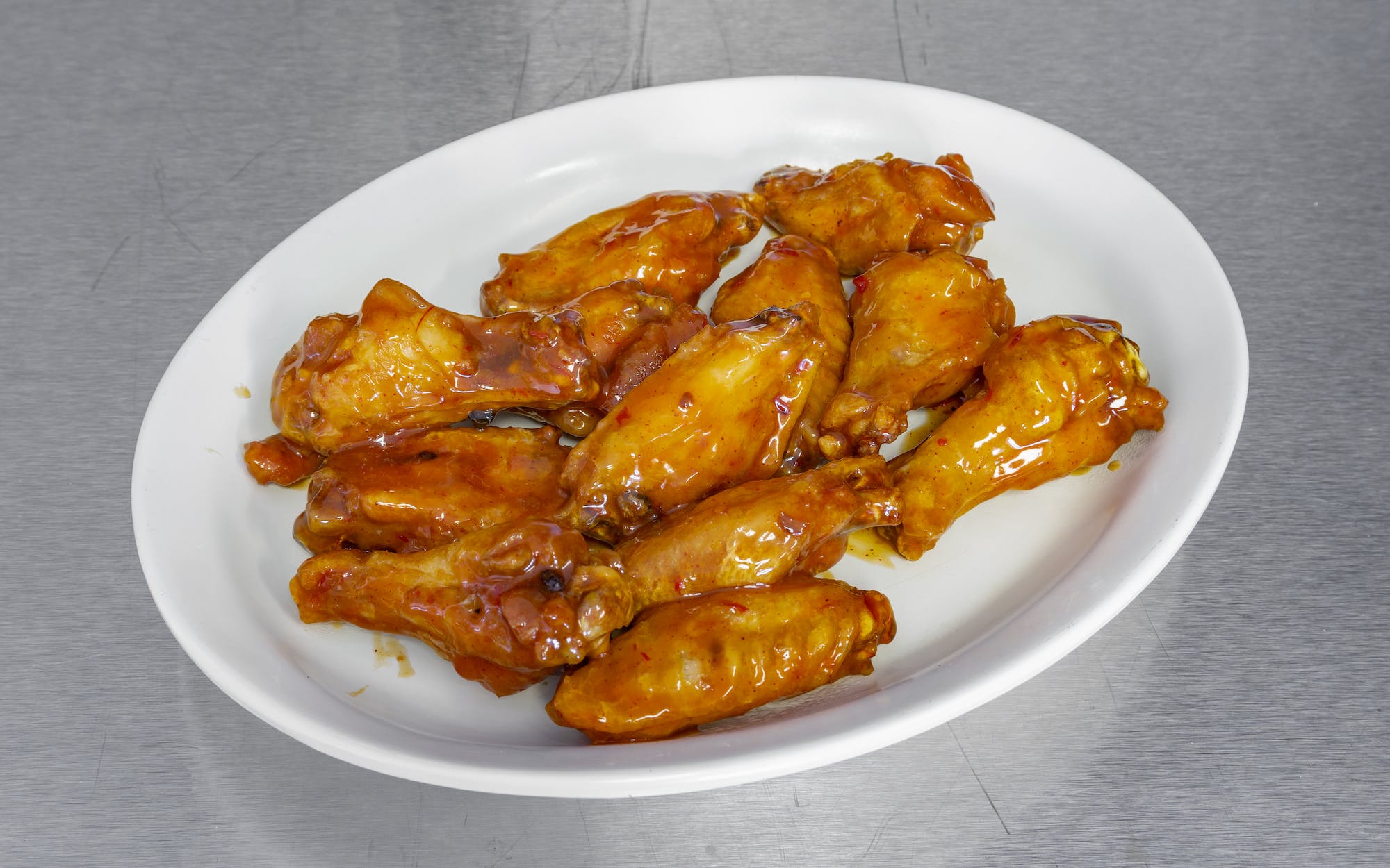 Order Chicken Wings food online from Papa Santiago's Pizzeria store, Chicago on bringmethat.com