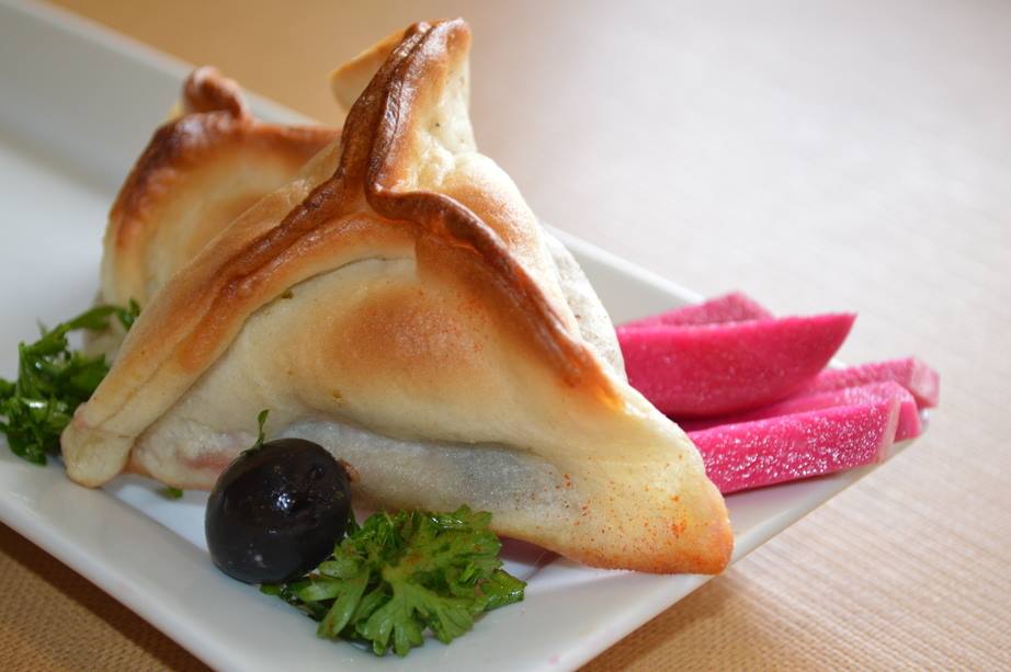 Order Spinach Pie Side (1 pc) food online from Zaytoon store, Lansing on bringmethat.com