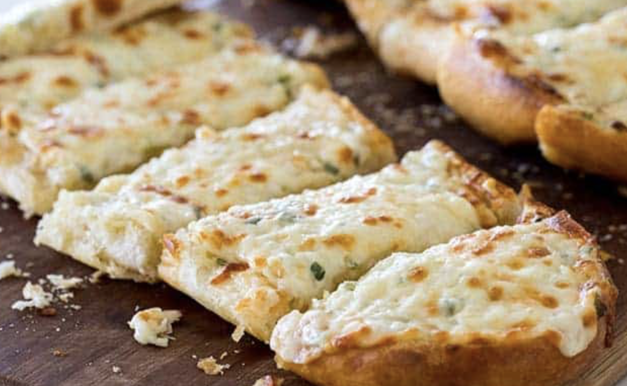 Order Garlic Bread with Cheese food online from Rhino's Pizzeria store, Webster on bringmethat.com