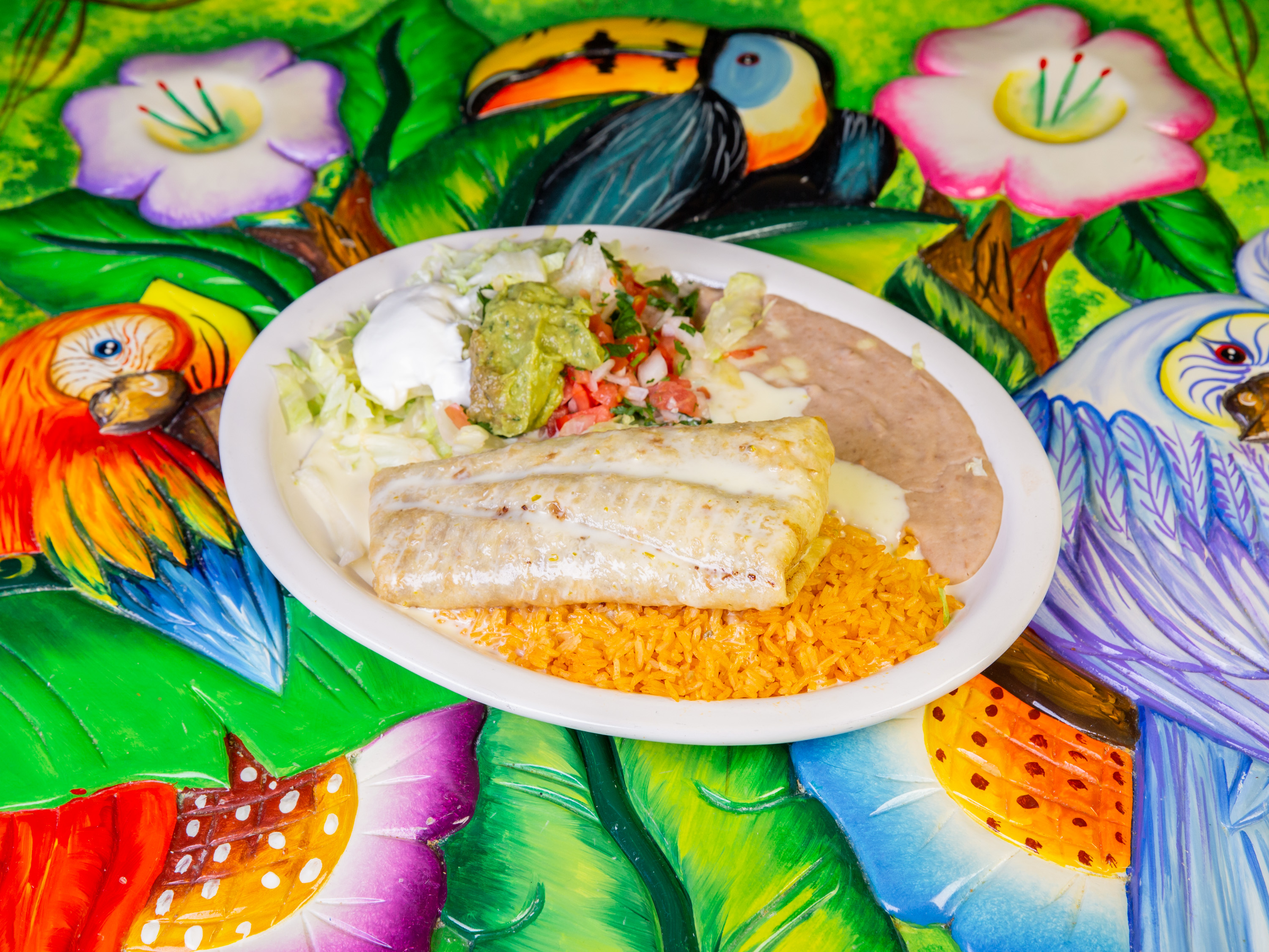 Order Lunch Chimichanga #23 food online from El Picante Mexican Restaurant store, Maineville on bringmethat.com