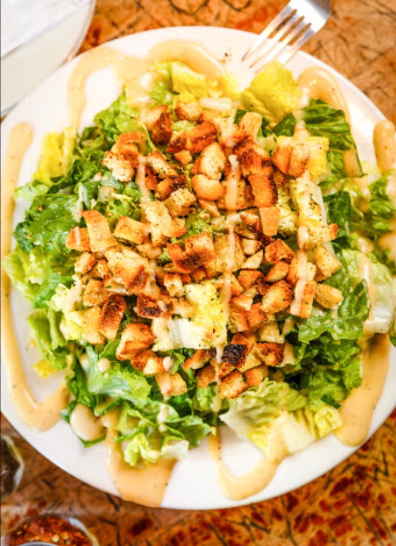Order Caesar Salad - Salad (Serves 2) food online from John Of Bleecker Street store, New York on bringmethat.com