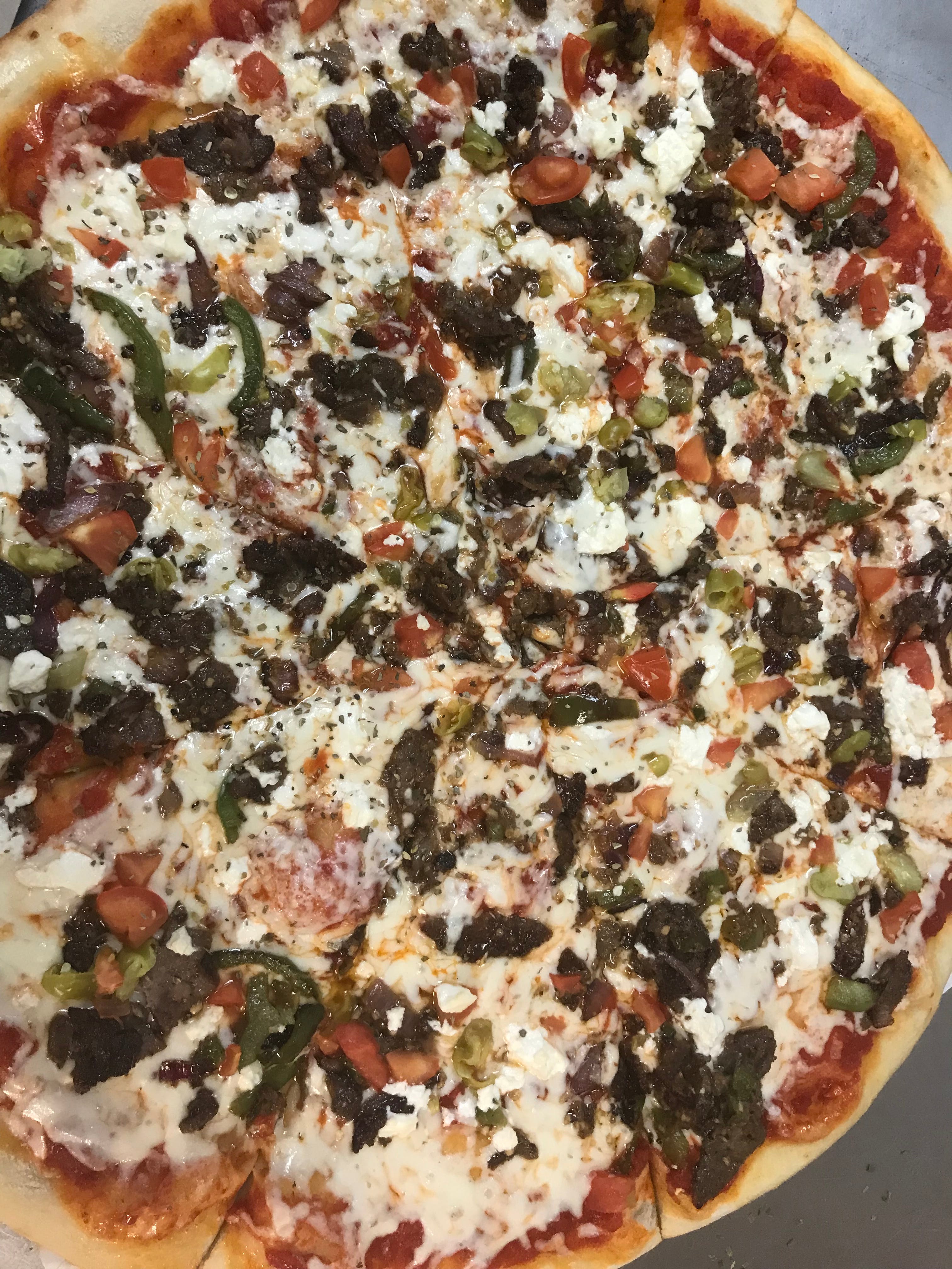 Order Veggie Lover's Pizza - Medium 12'' (8 Slices) food online from Italian Pizza & Grill store, Daytona Beach on bringmethat.com