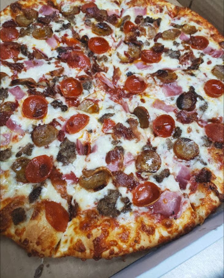 Order Meat Lover's Pizza - Small (6 Pieces) food online from Zino's Subs & Pizza store, Madison Heights on bringmethat.com